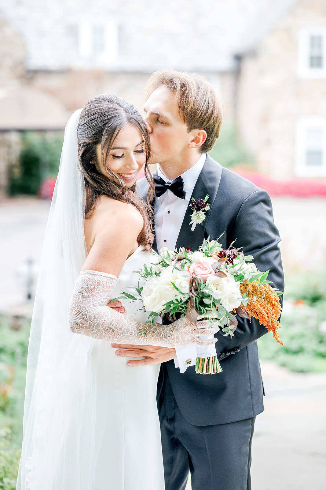 bride and groom embracing