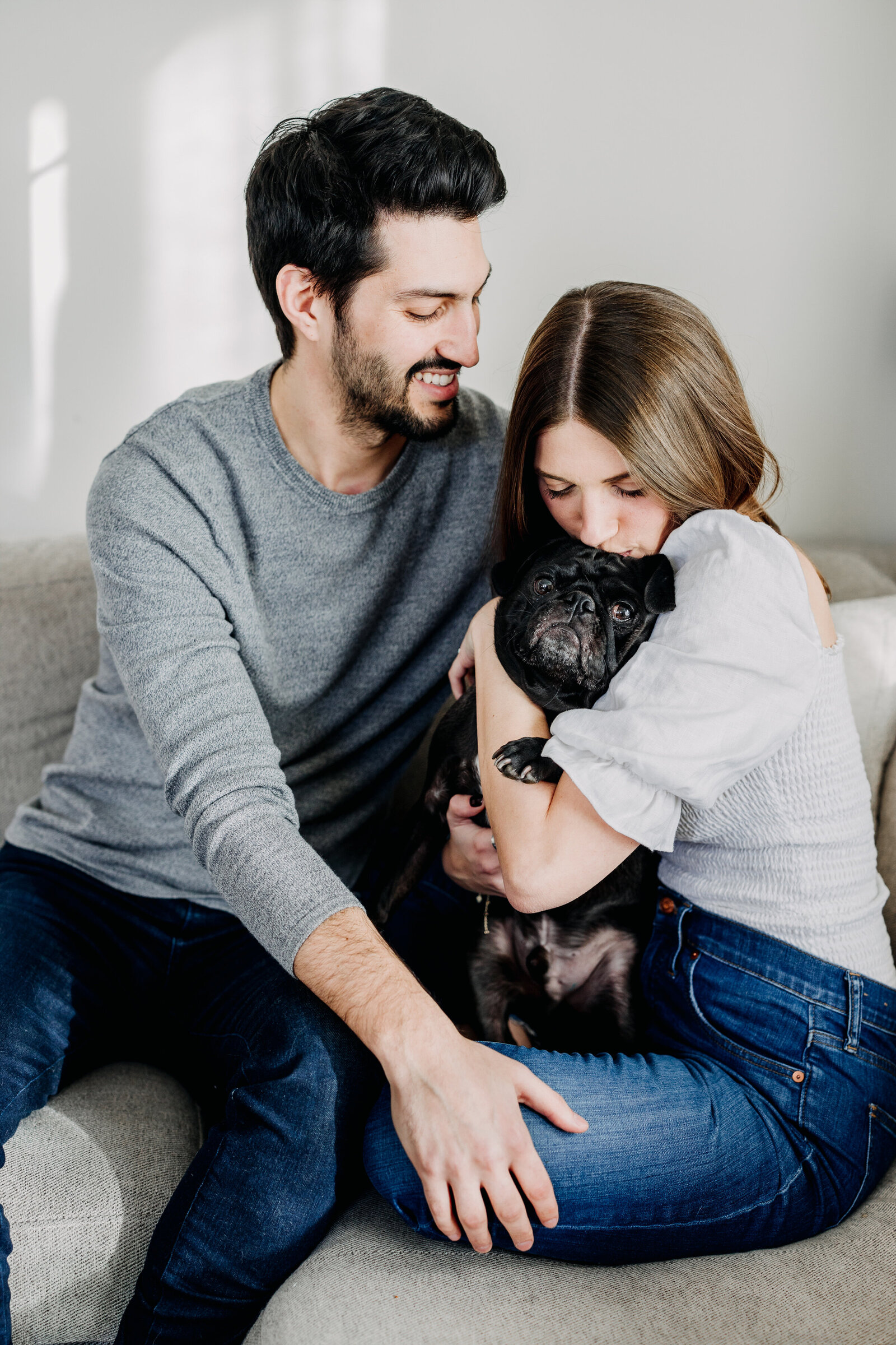 couple at home with dog