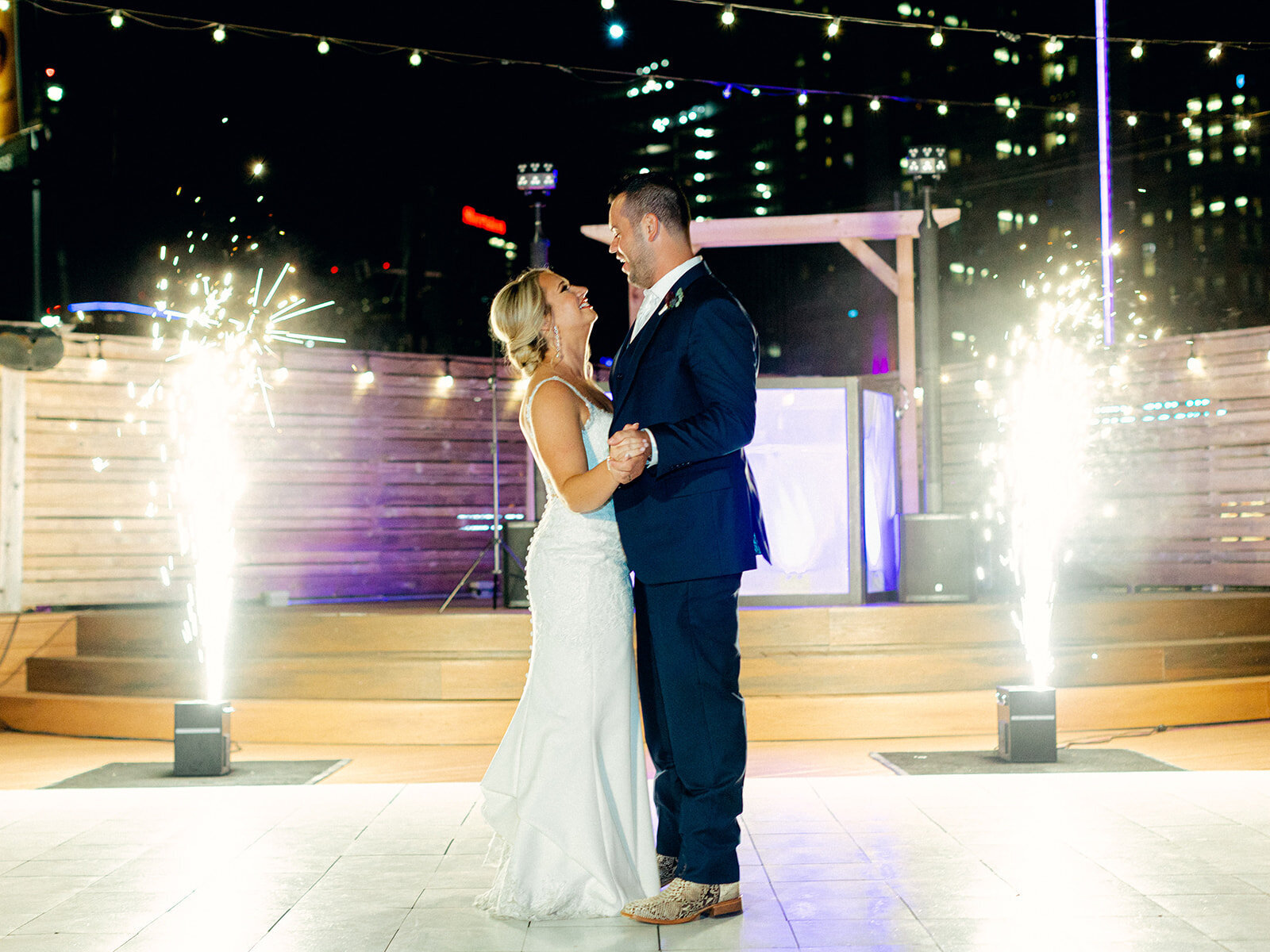 Bride and Groom dancing their first dance with sparklers