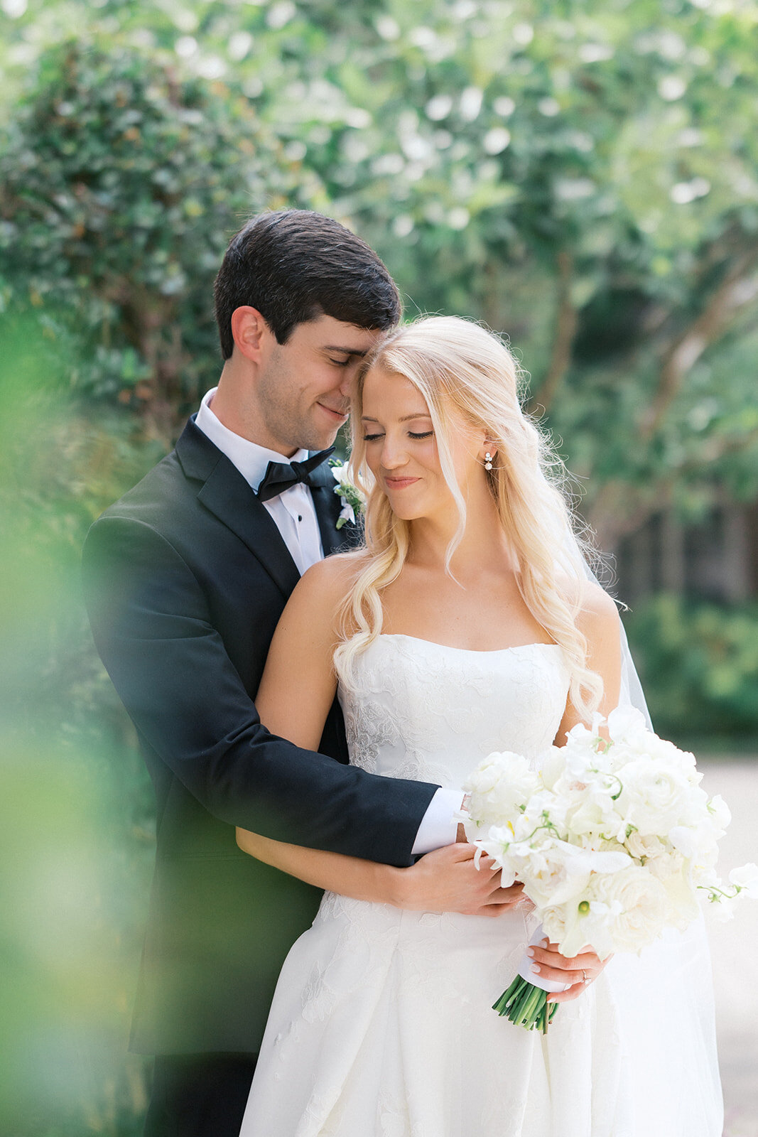 groom holds bride at wedding at the florentine in birmingham alabama