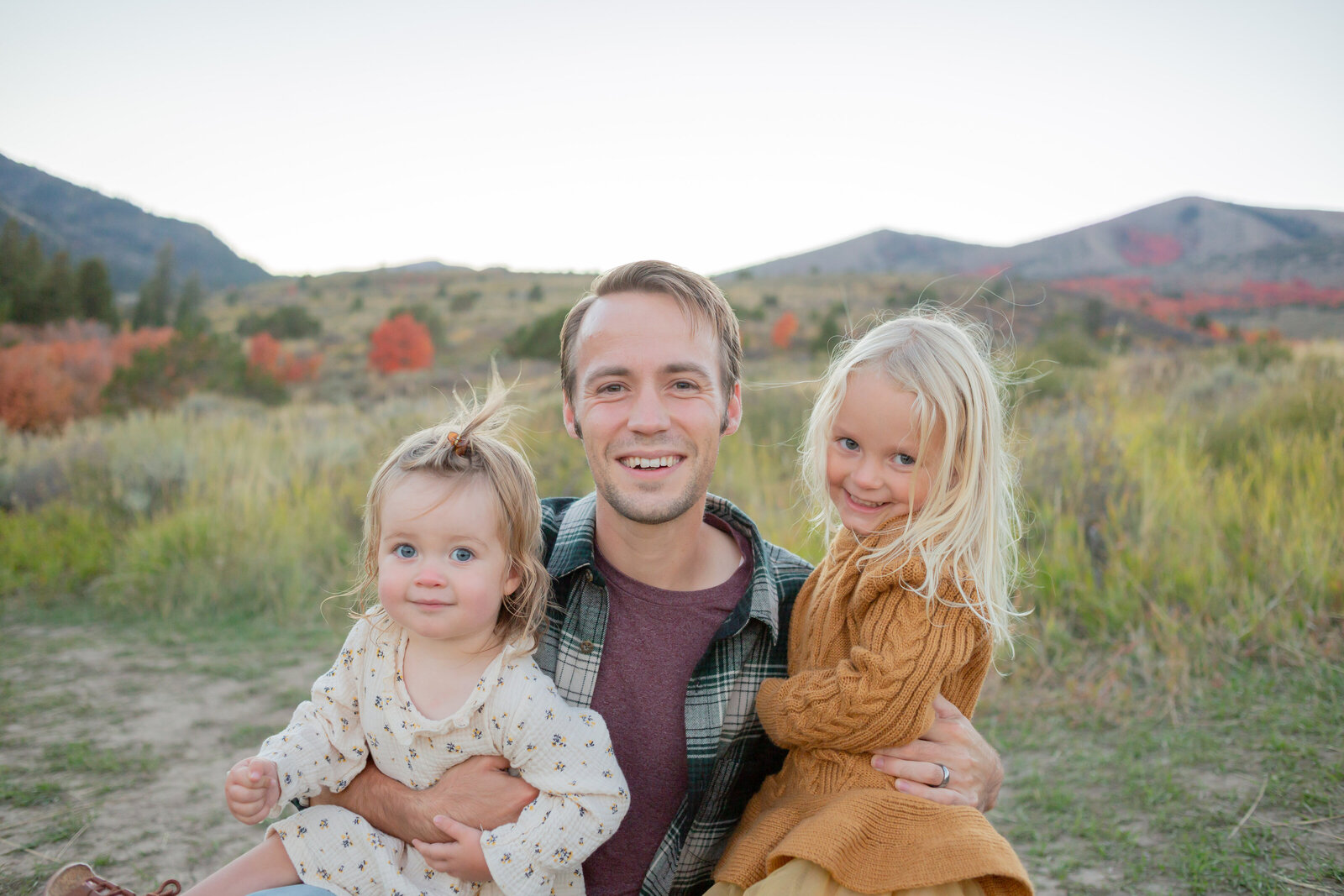 Seattle Wedding Photographer captures dad with girls smiling at camera