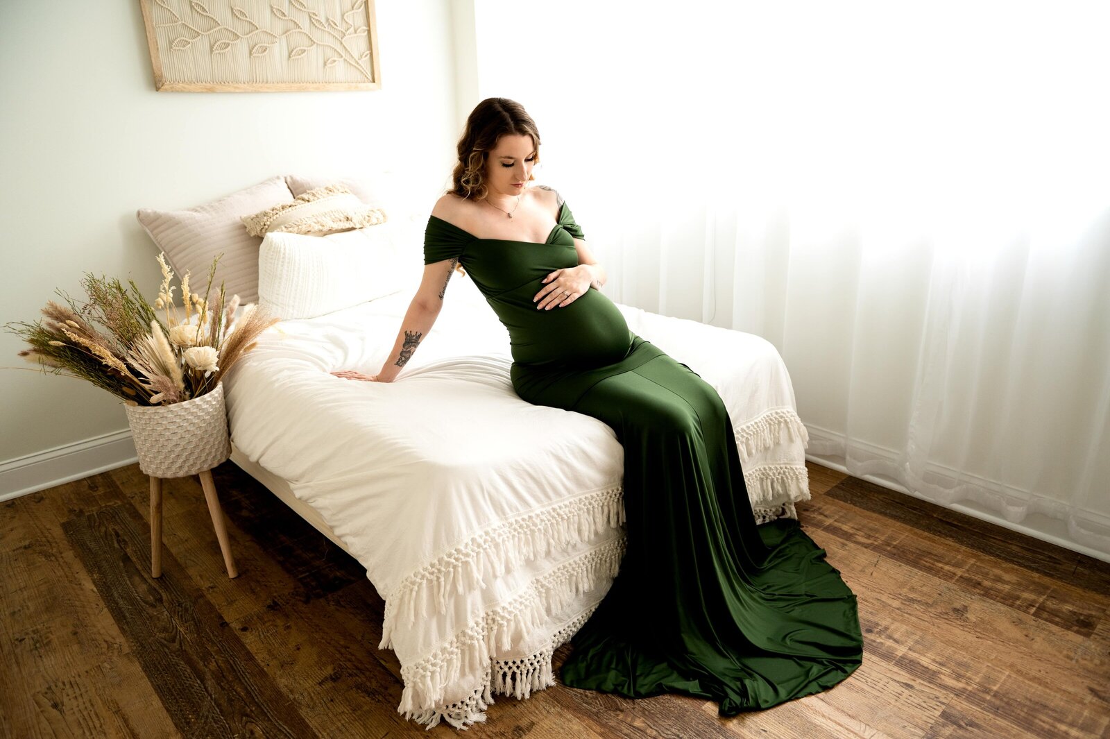 pregnant mom doing a studio maternity session