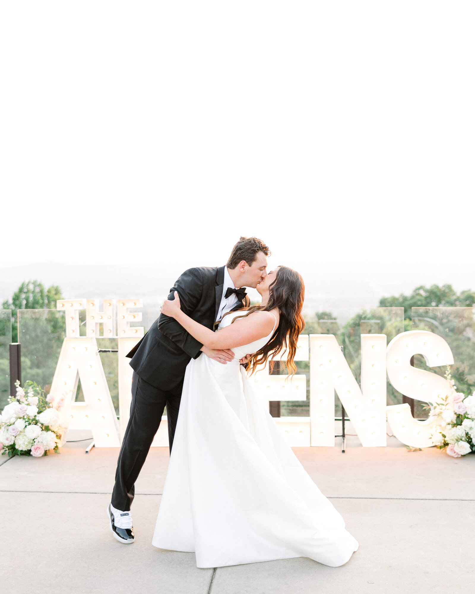 Alabama engagement and wedding photography featuring Sarah Kate and Thomas in a serene outdoor setting.