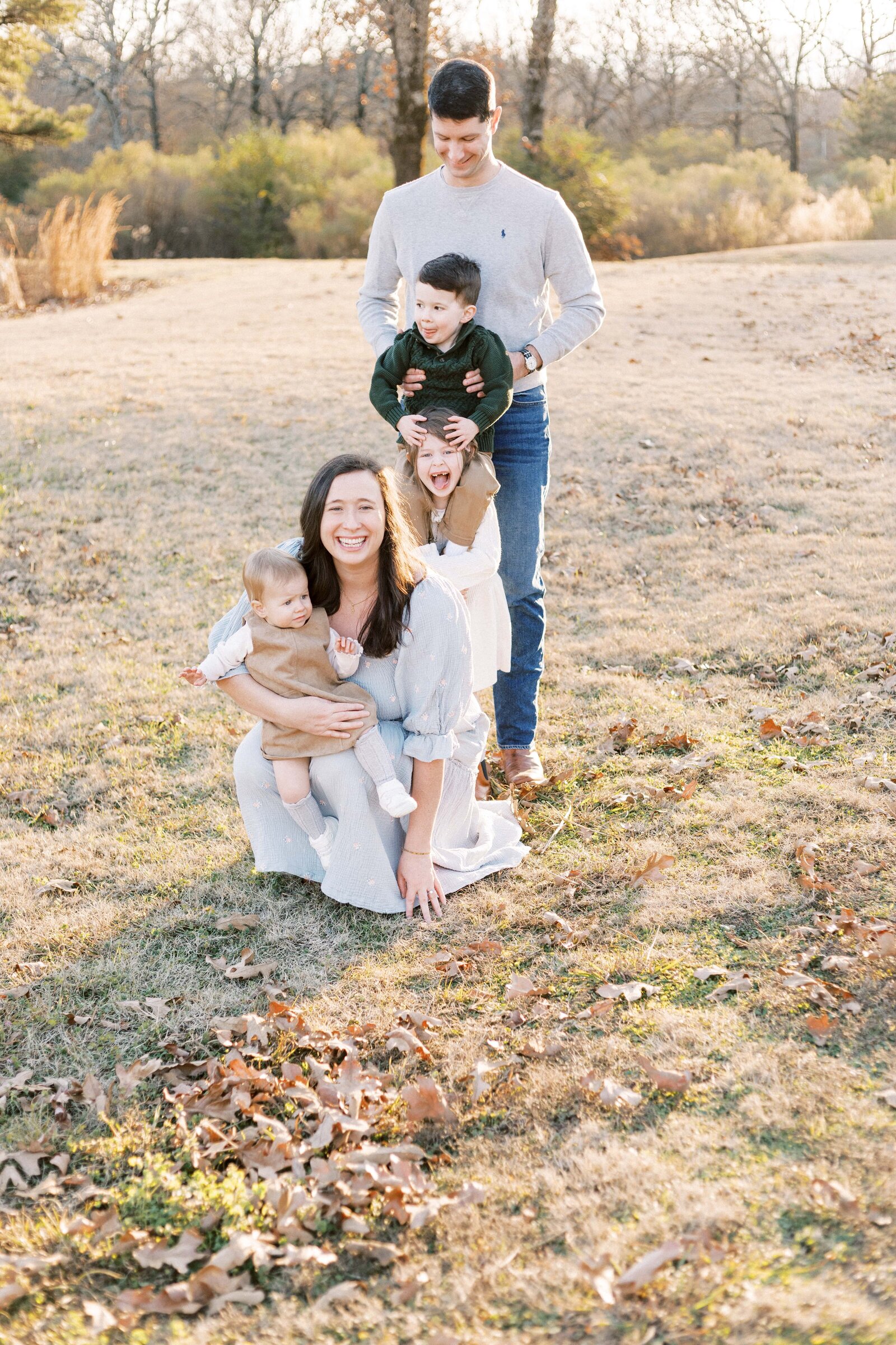 family playing outside during peoria illinois family photos 