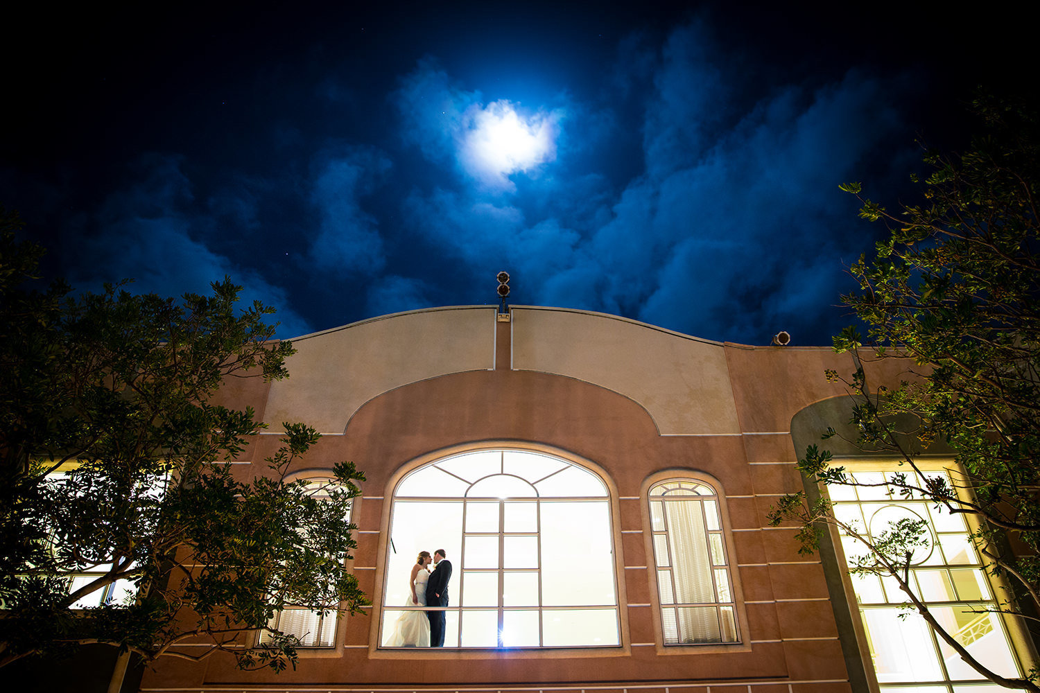 night shot at loews coronado bride and groom