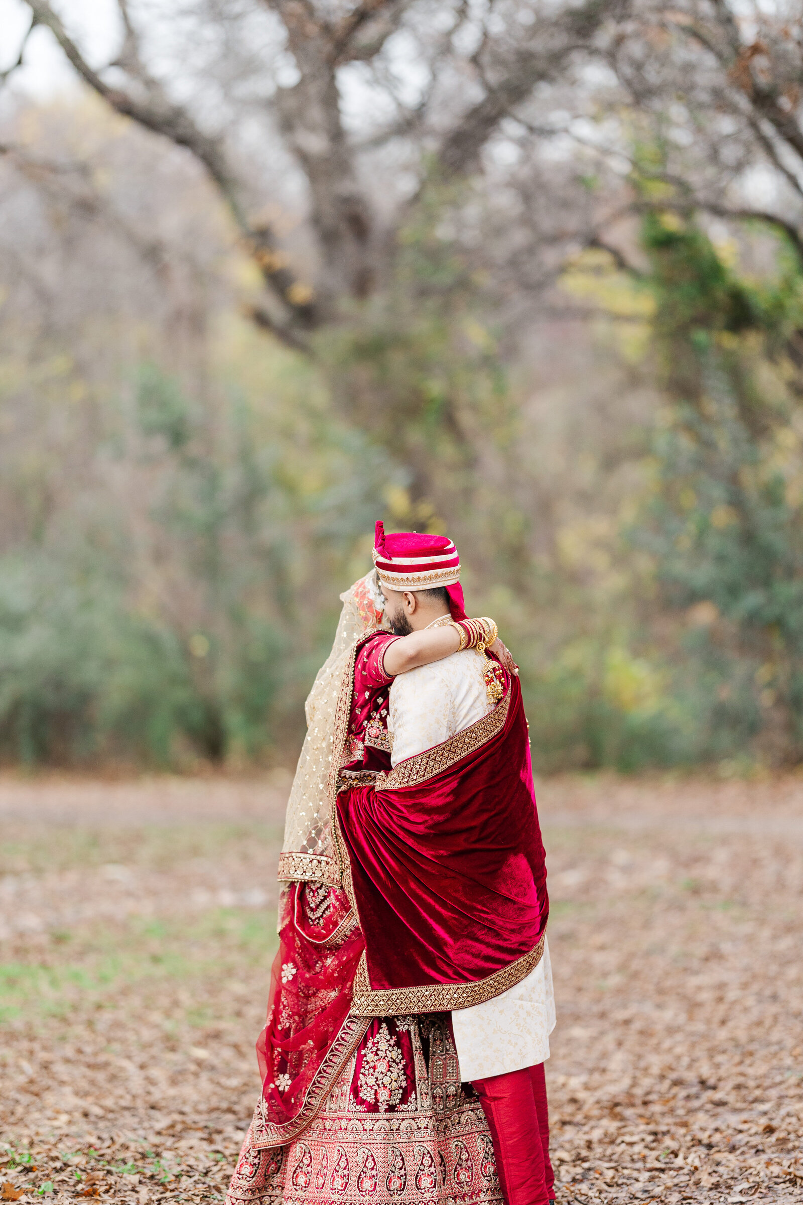 Bride-and-groom-hug-outdoor-portrait