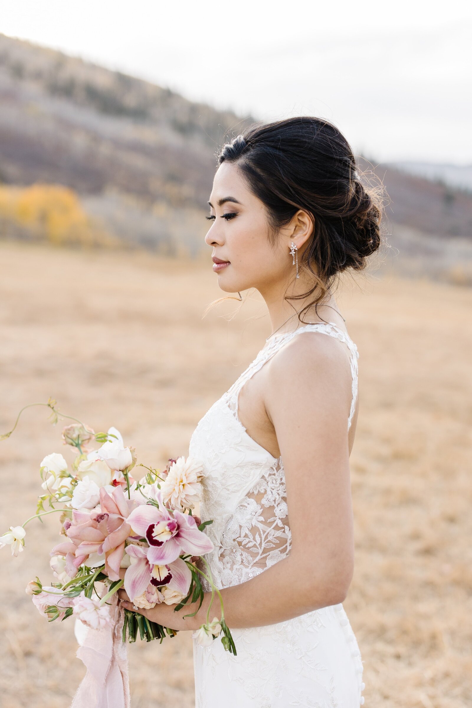 bride with mountains behind her