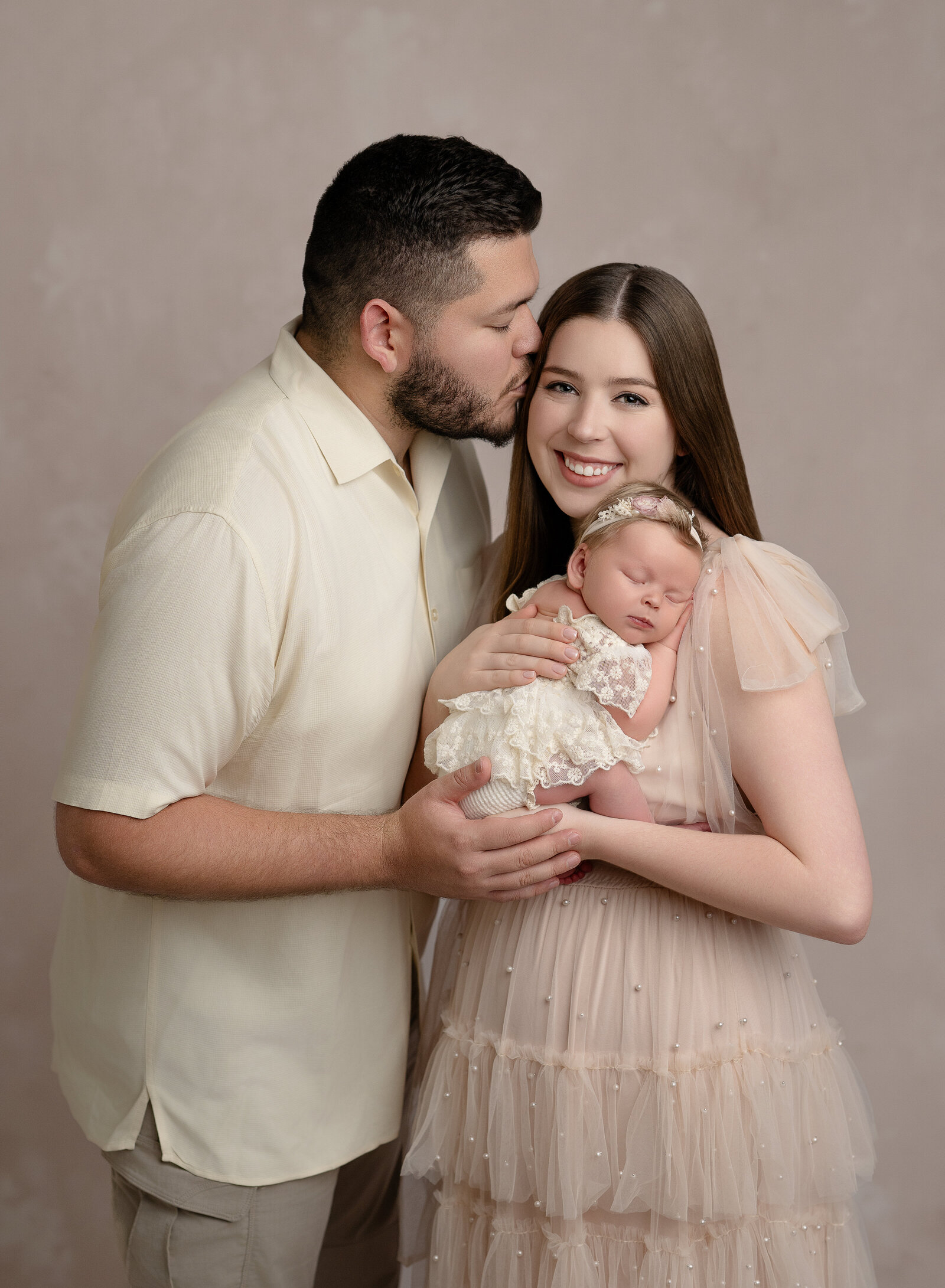 studio newborn family photos