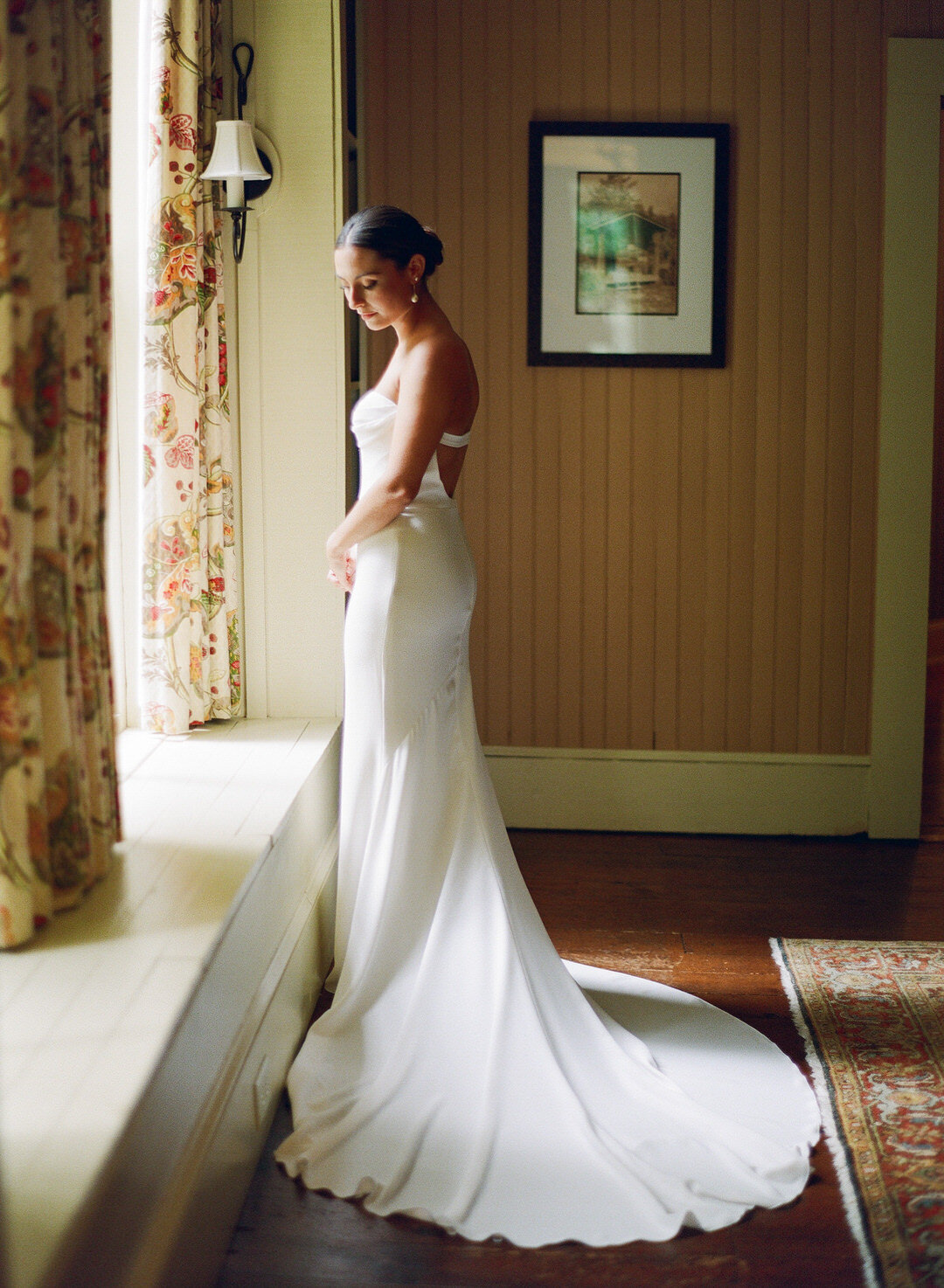 Bride in front of window at Old Edwards Hutchinson House