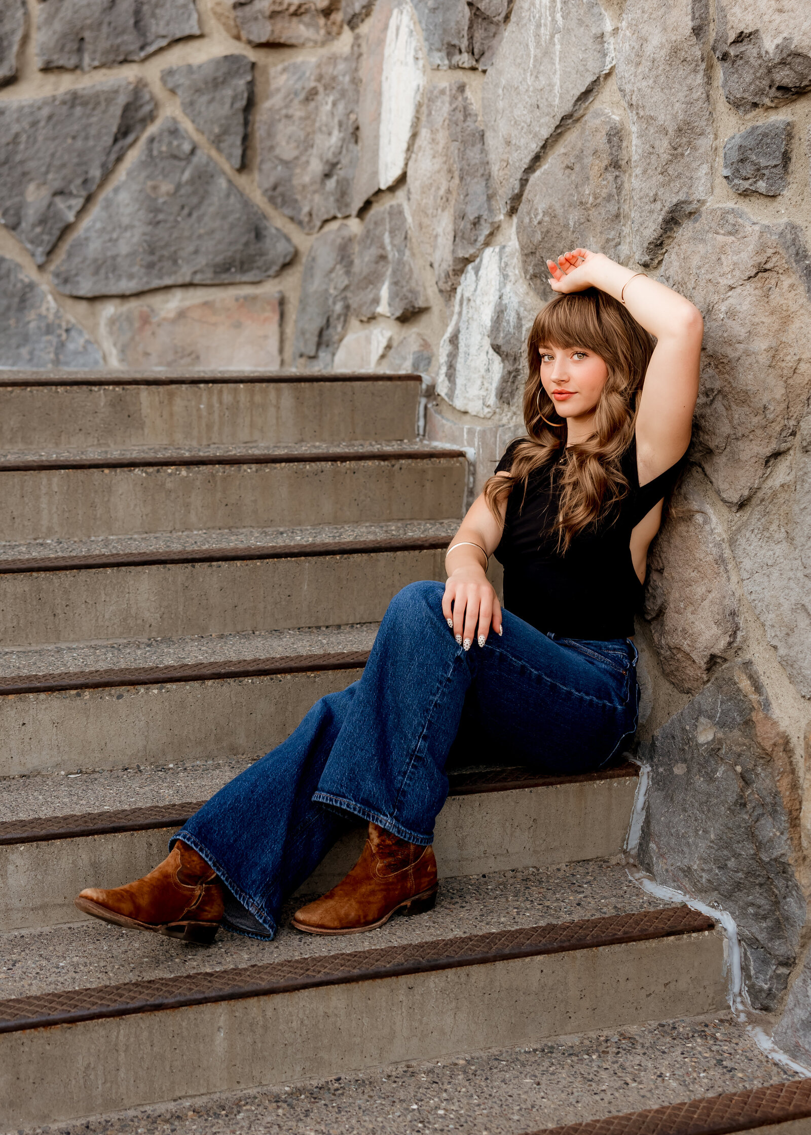 Sandy High School senior doing senior portraits at sunset at Timberline Lodge.