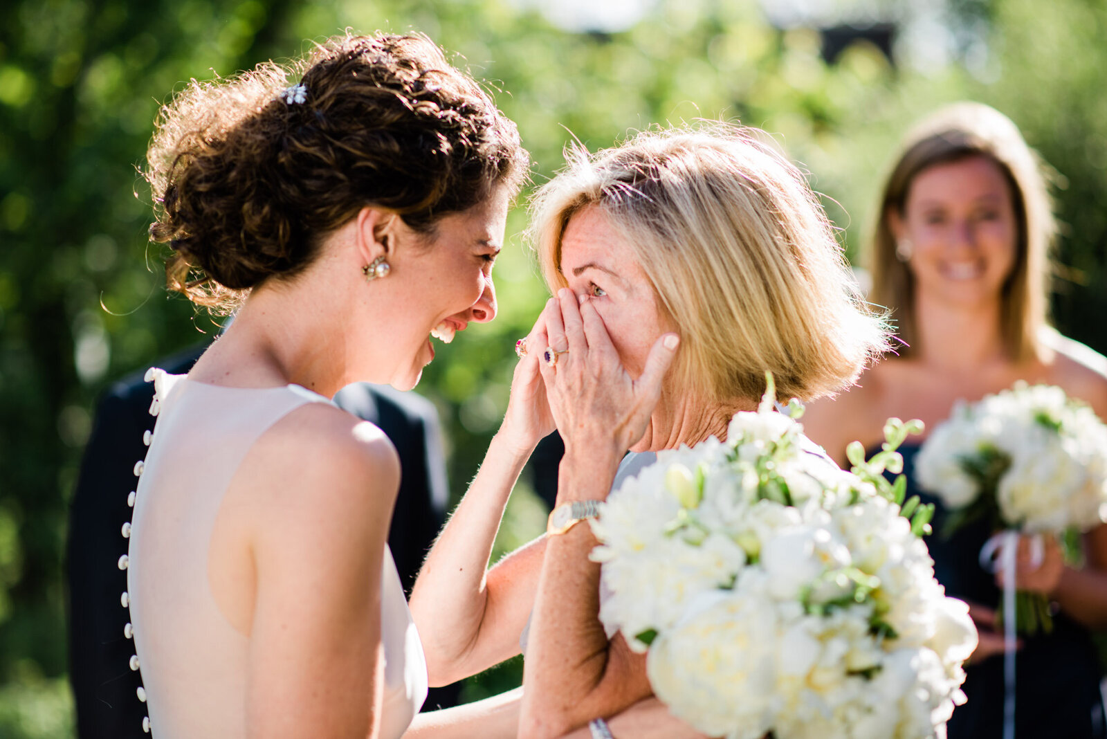 bride and mom happy tears
