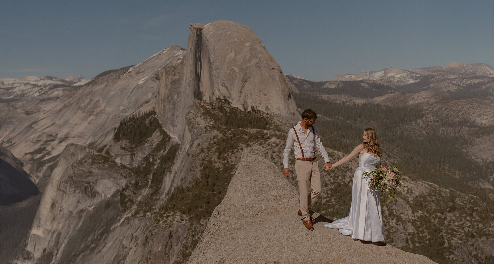 bride and groom eloping at glacier point in yosemite