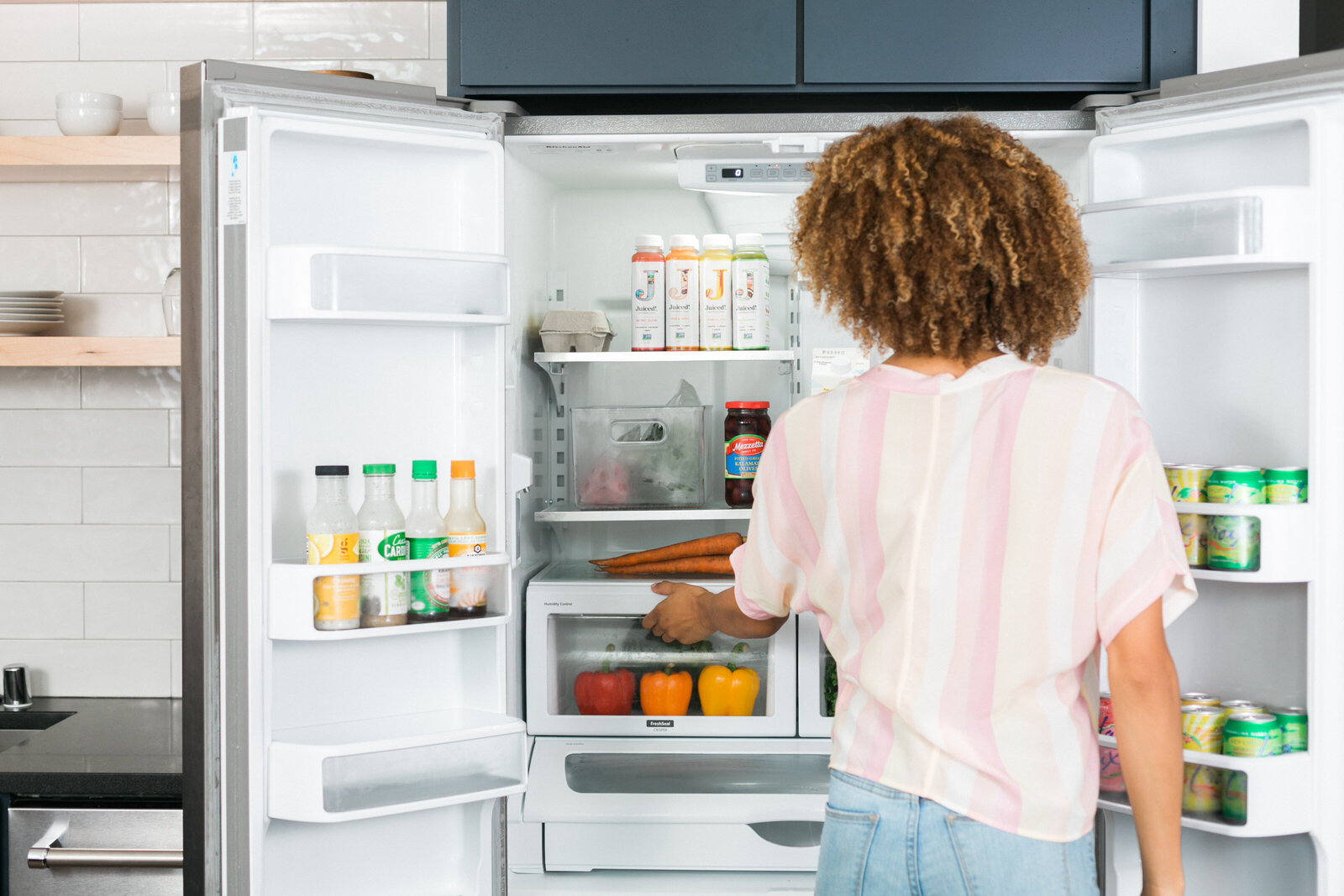 brand photography for health and wellness coach, open fridge with fresh fruit