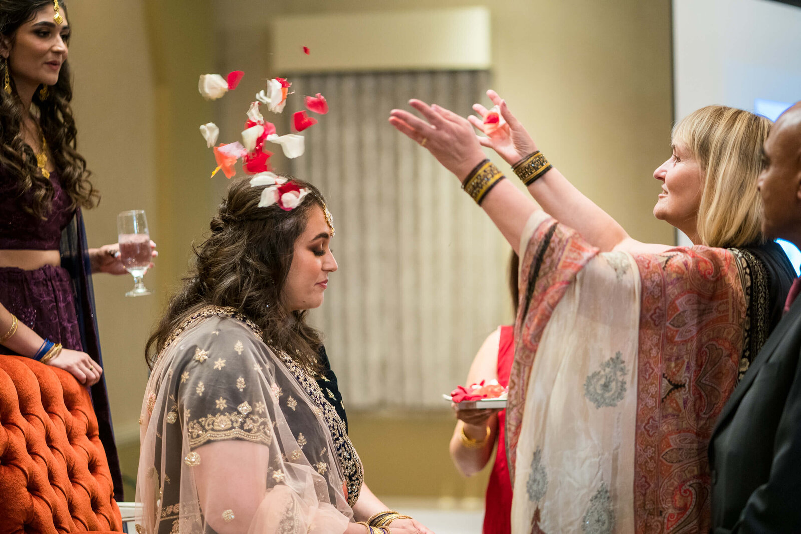 East Indian Bride showered with rose pedals