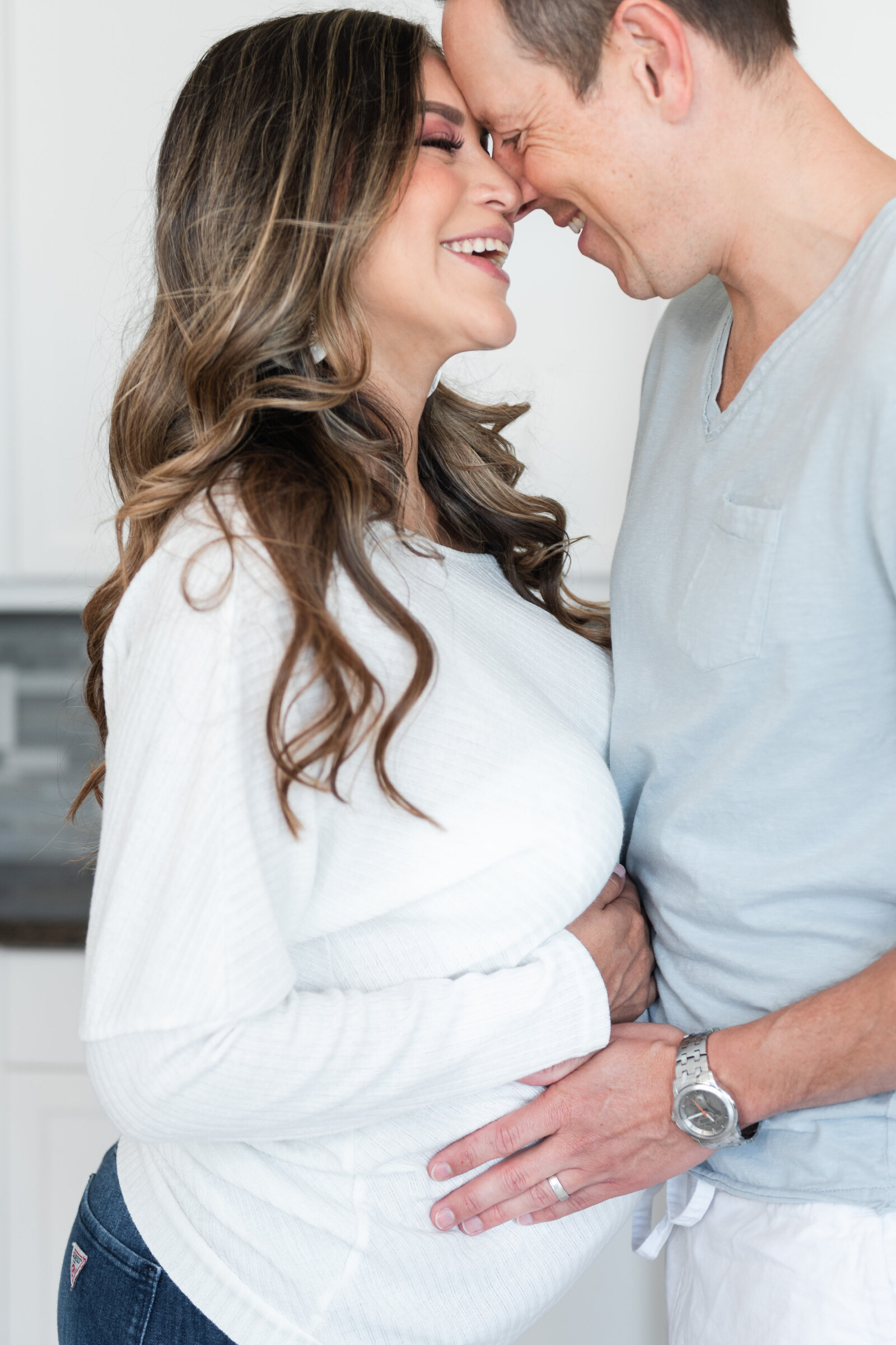 expecting mom and dad in home kitchen maternity session by miami lifestyle photographers David and Meivys MSP Photography