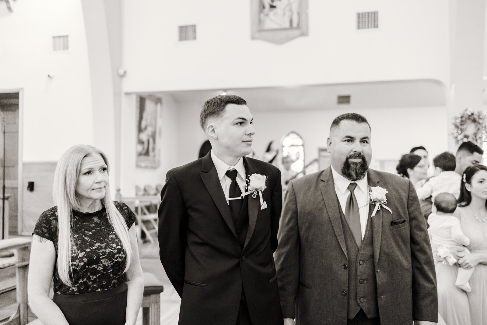 Groom Watches his soon to be Wife walking down the isle at Saint Anne's Catholic Church