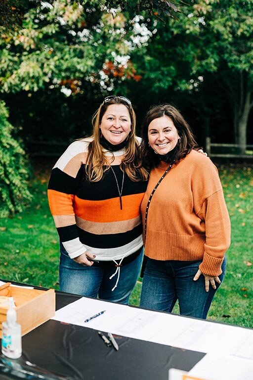 Two ladies smiling at Fall Fest