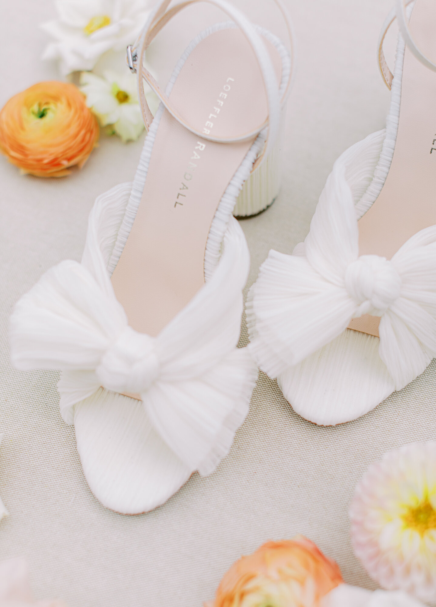 White elegant  wedge shoes for bride.