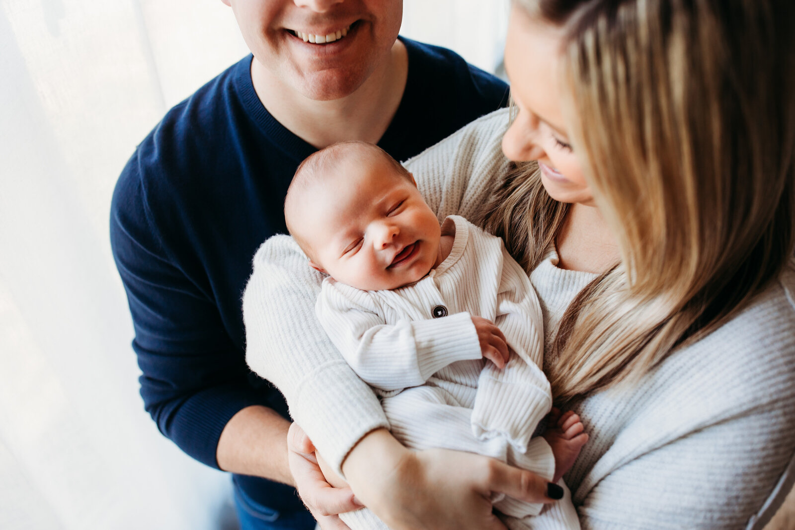 new mom and dad, session at home, smilies, happy family, family of 3 , newborn session