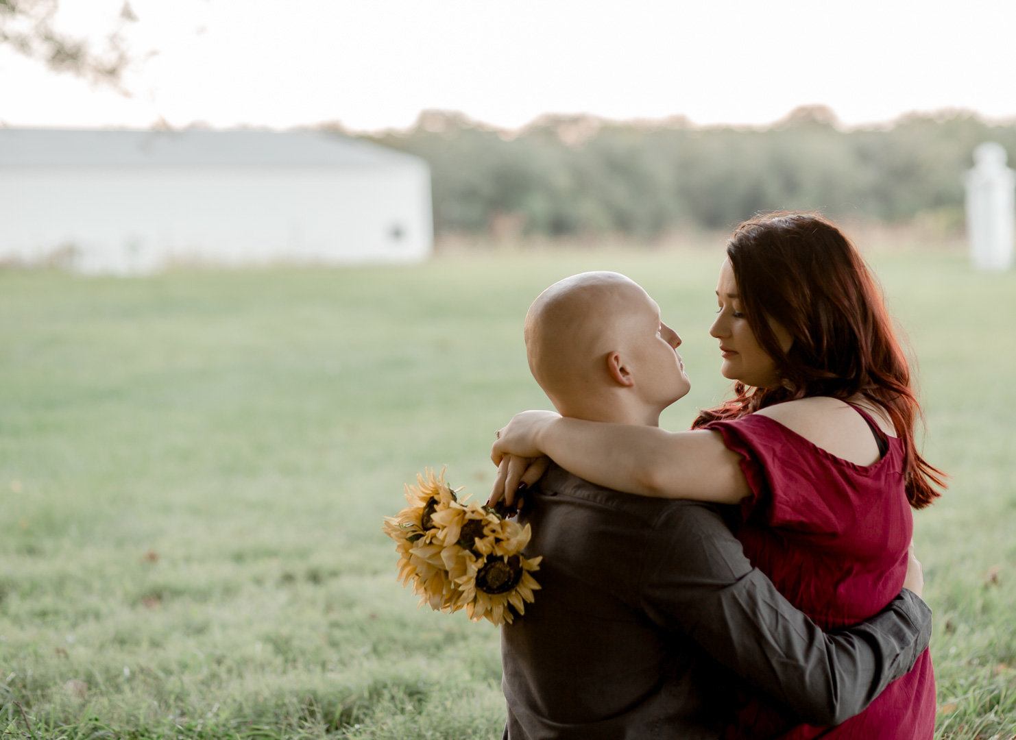 Engagement session in sunflower field0007