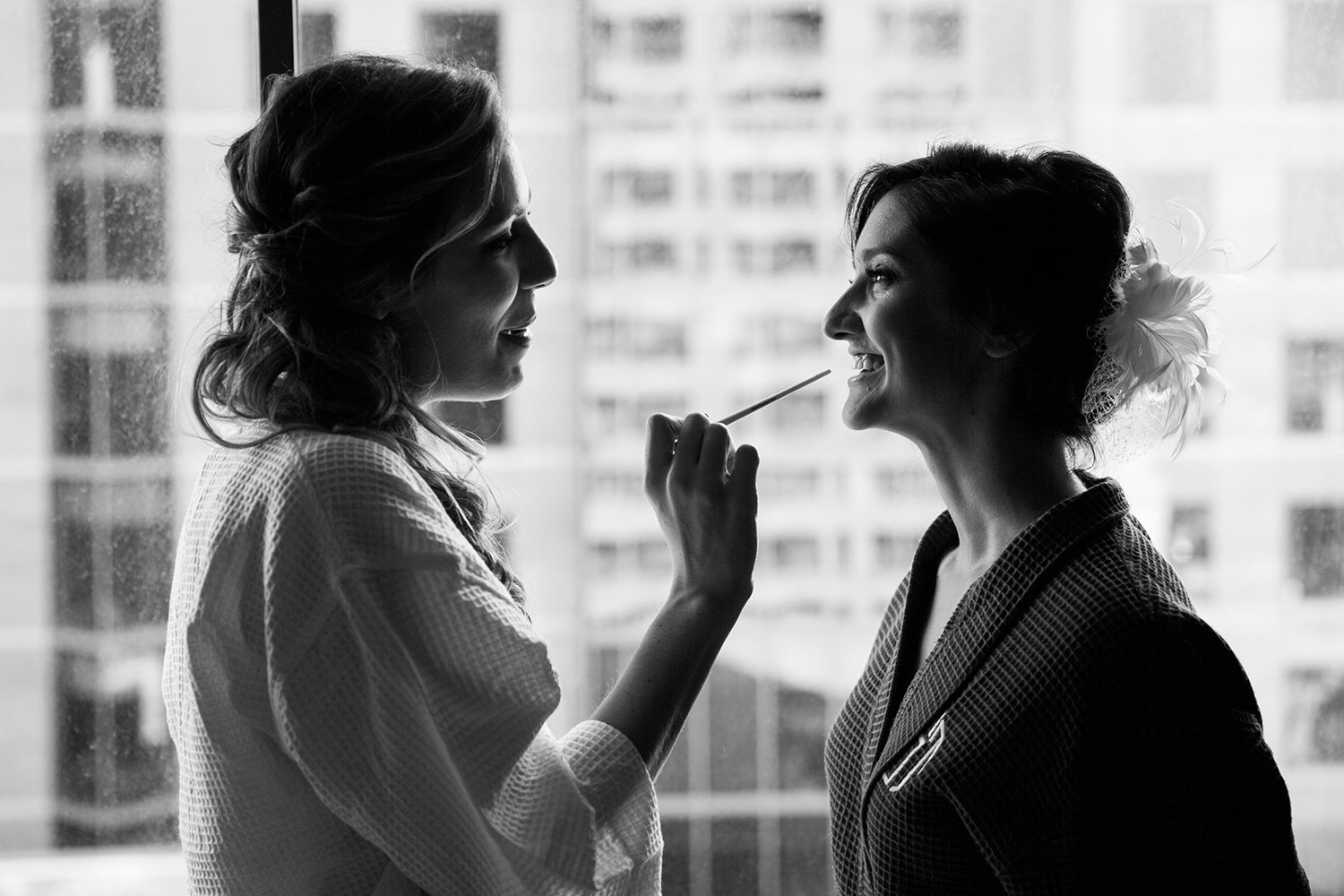 bride getting ready black and white