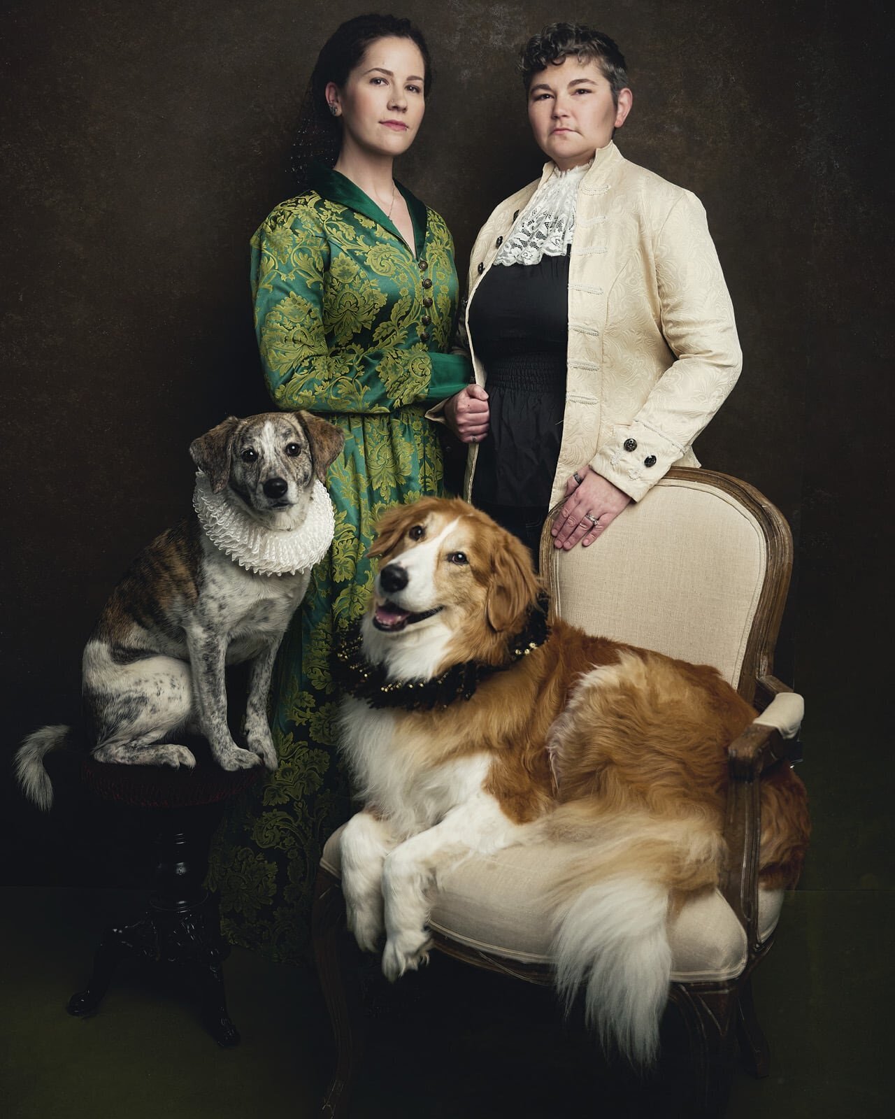 Elegant Family Portrait Featuring Two Women and Their Beloved Dogs-44