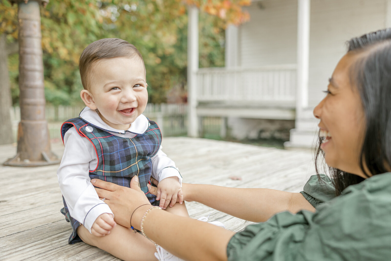 Baby smiling at camer in Alexandria VA