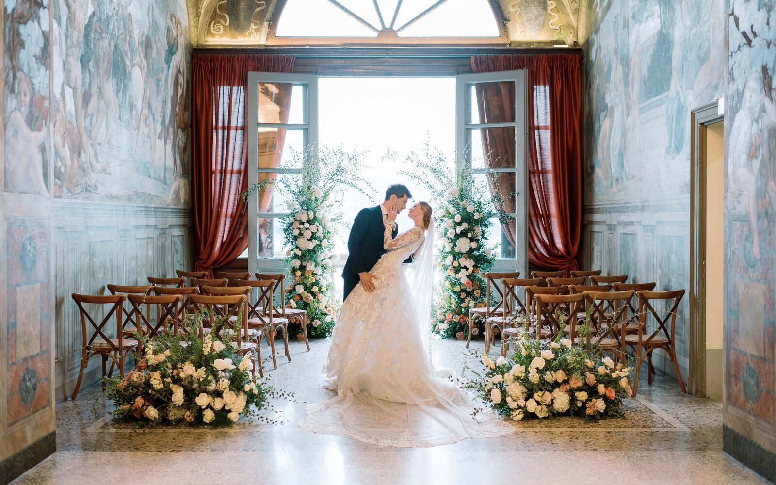 A-bride-and-groom-are-in-front-of-an-irish-castle