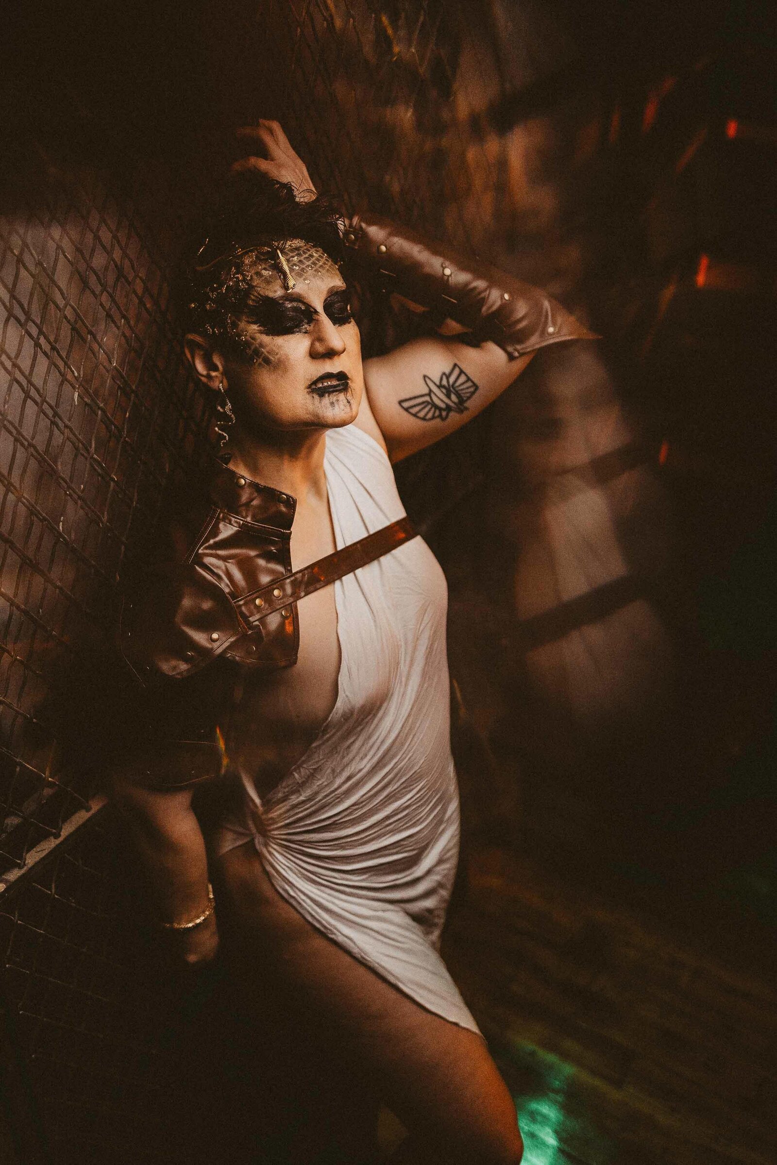spooky woman leaning on the wall