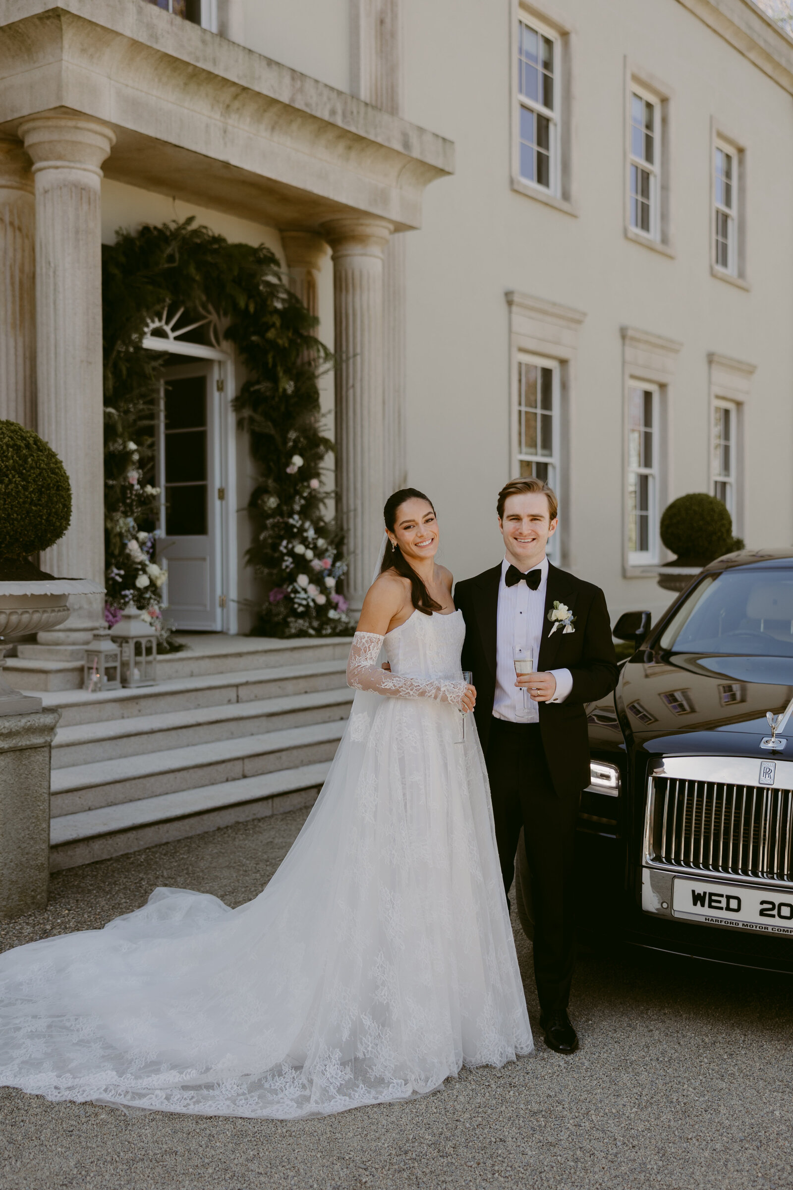 Bride wearing lace ball gown for traditional wedding