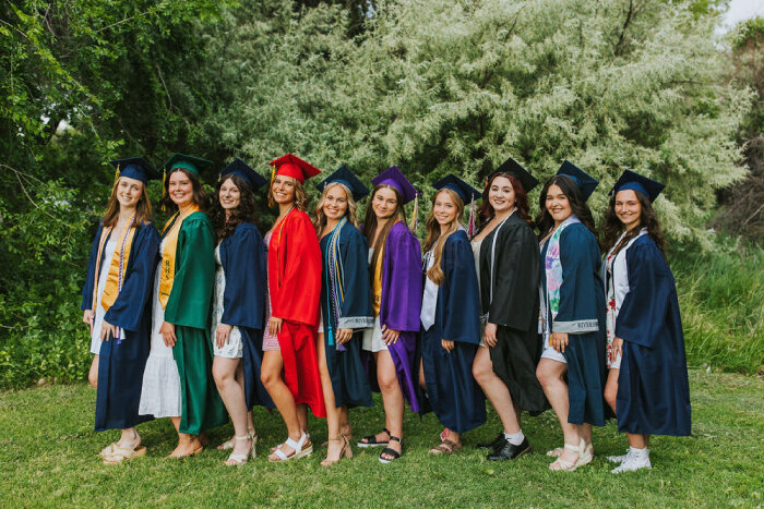 Cap and gown photos by senior portrait photographer