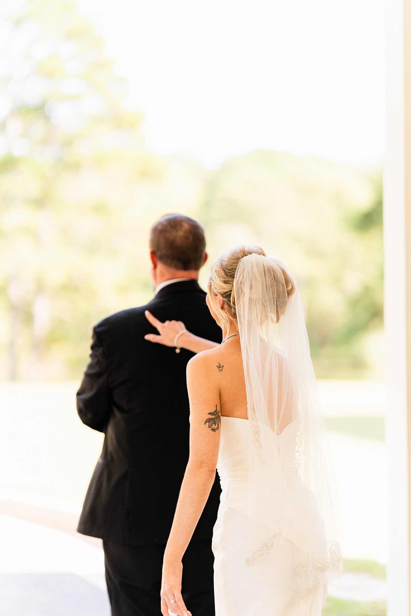 Bride is doing a first look with her step father who plays a major role in her life. 