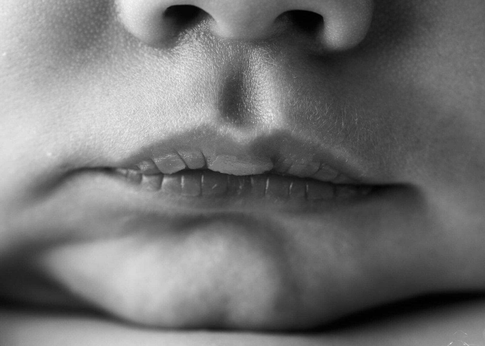 close-up of baby lips in black and white