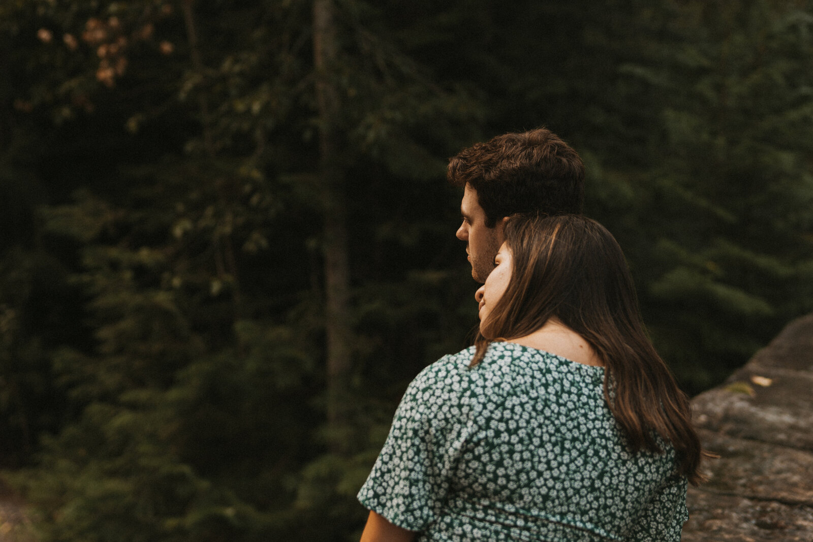 Couple sitting together in Glacier National Park Montana