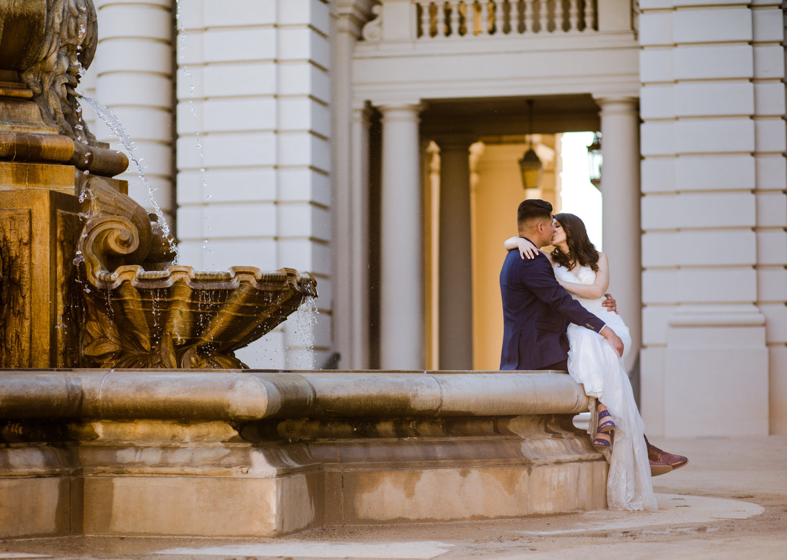 bride and groom kissing at pasadena city hall