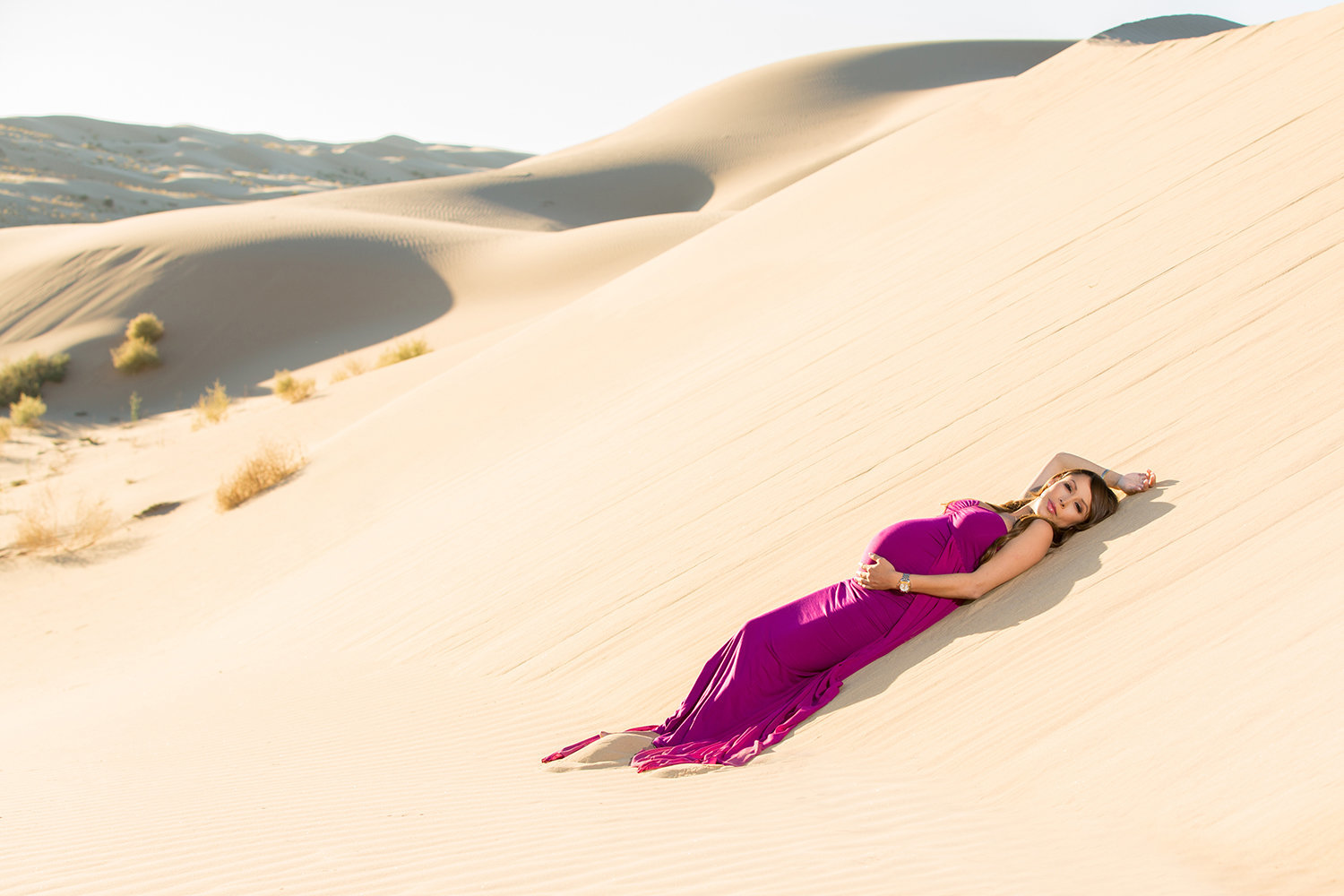 Dramatic pose for Maternity photo in the Glamis Sand Dunes.