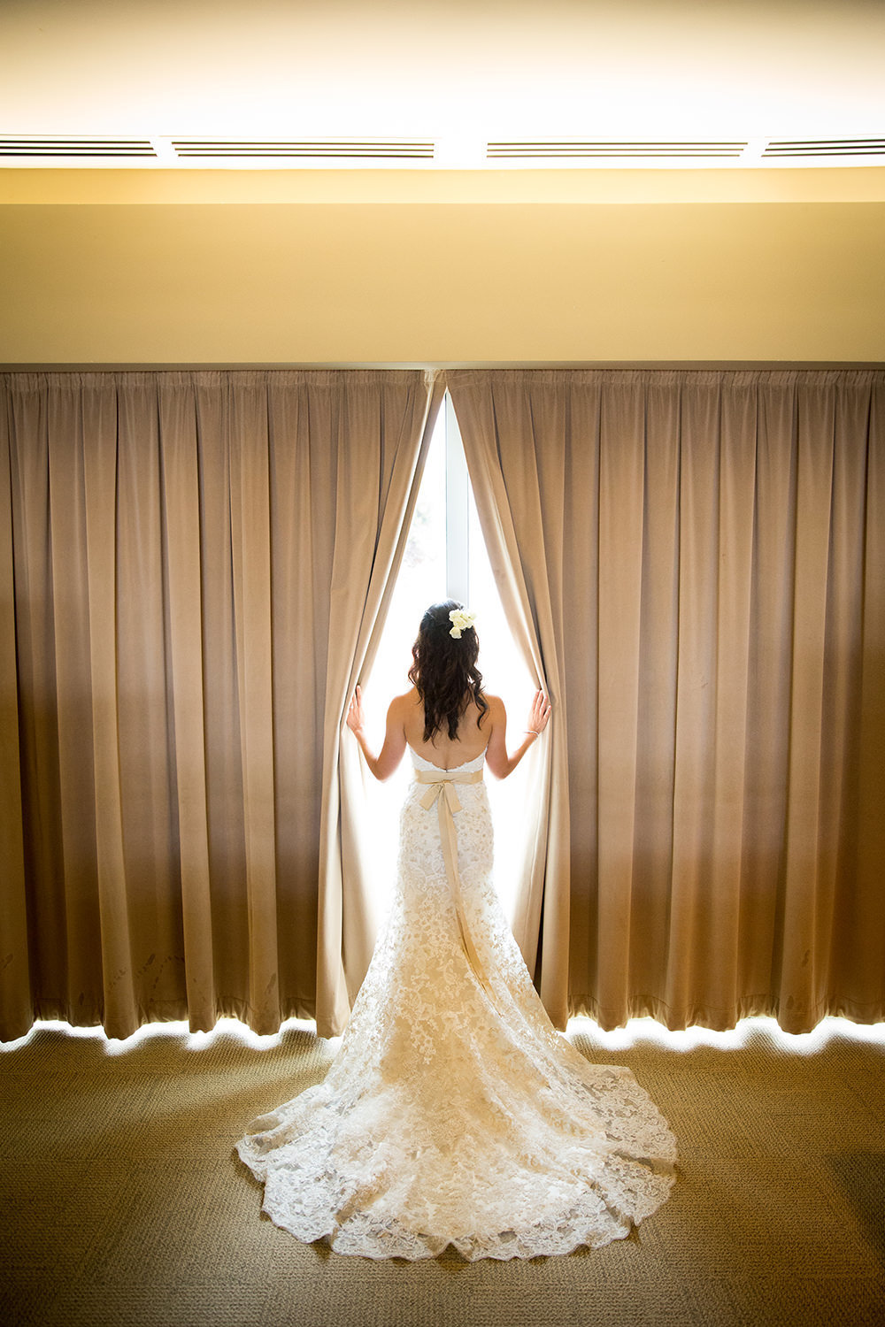 back of bridal dress getting ready