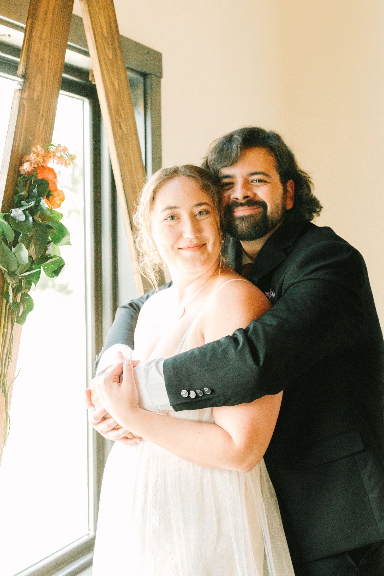 A couple celebrates their intimate elopement at a cabin at Big Bear Lake, California.