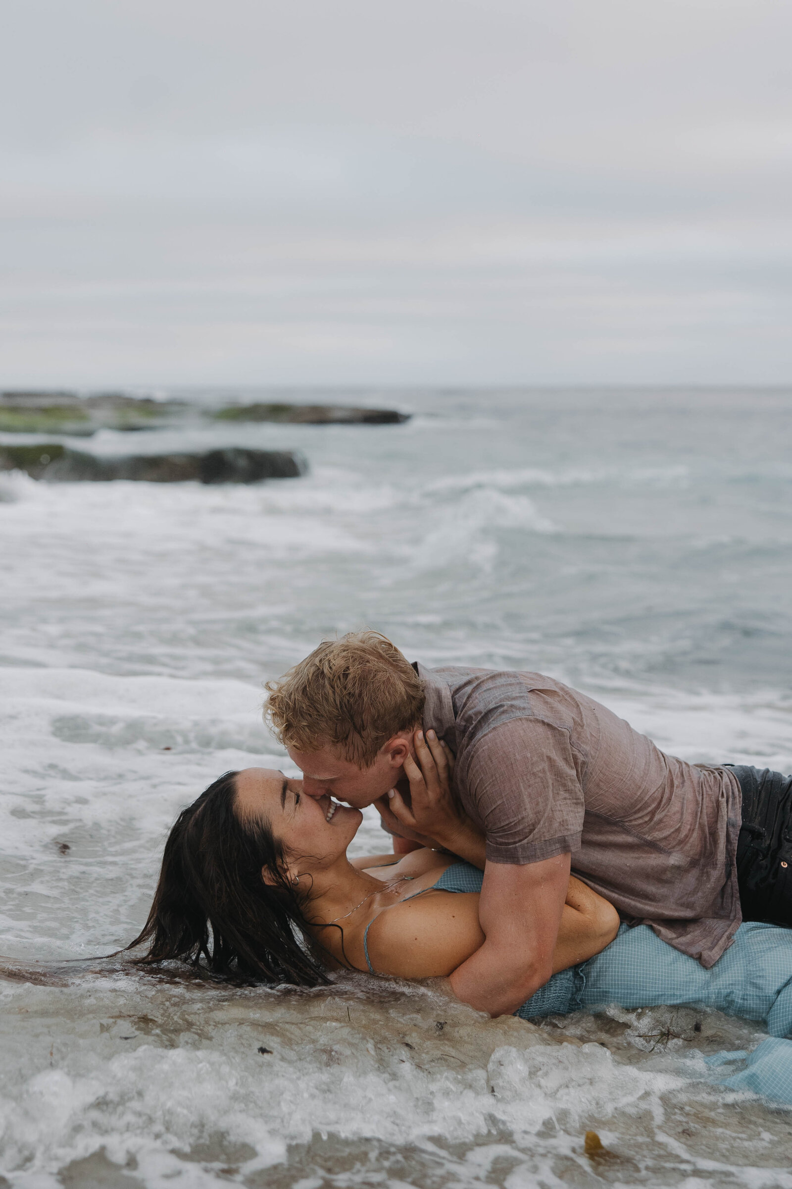 couple rolling in water