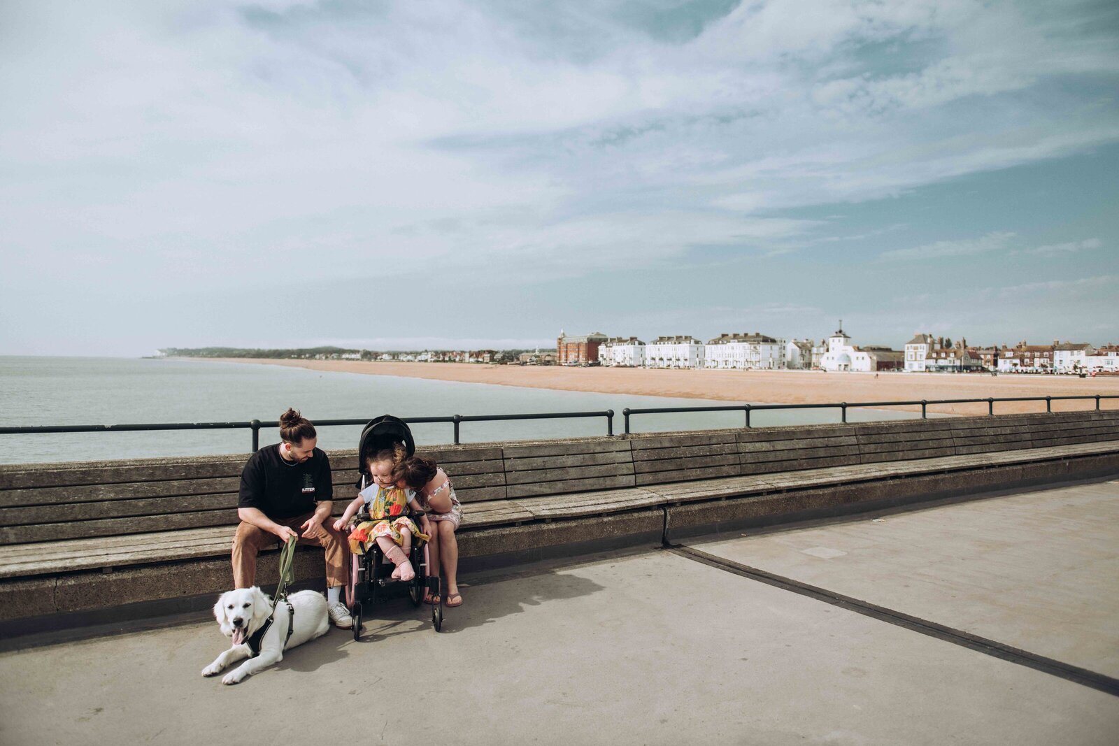 Family photo shoot of a family on Deal Pier in Kent including family dog