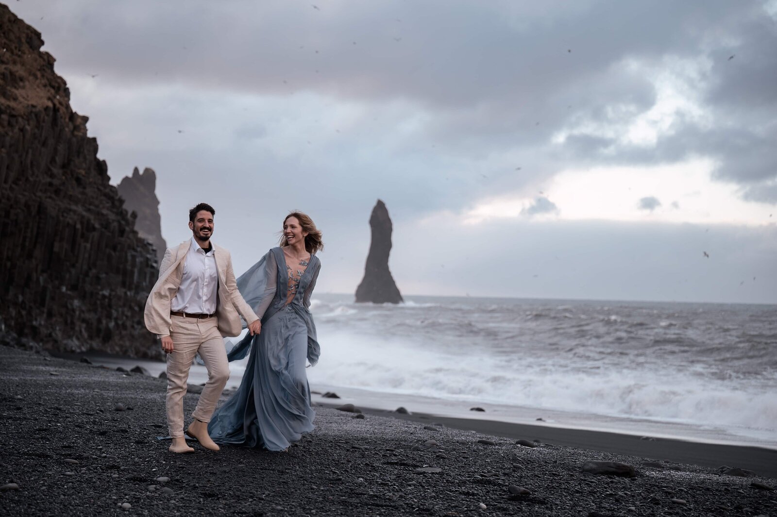 Romantic elopement portraits on the black sand beach at Reynisfjara
