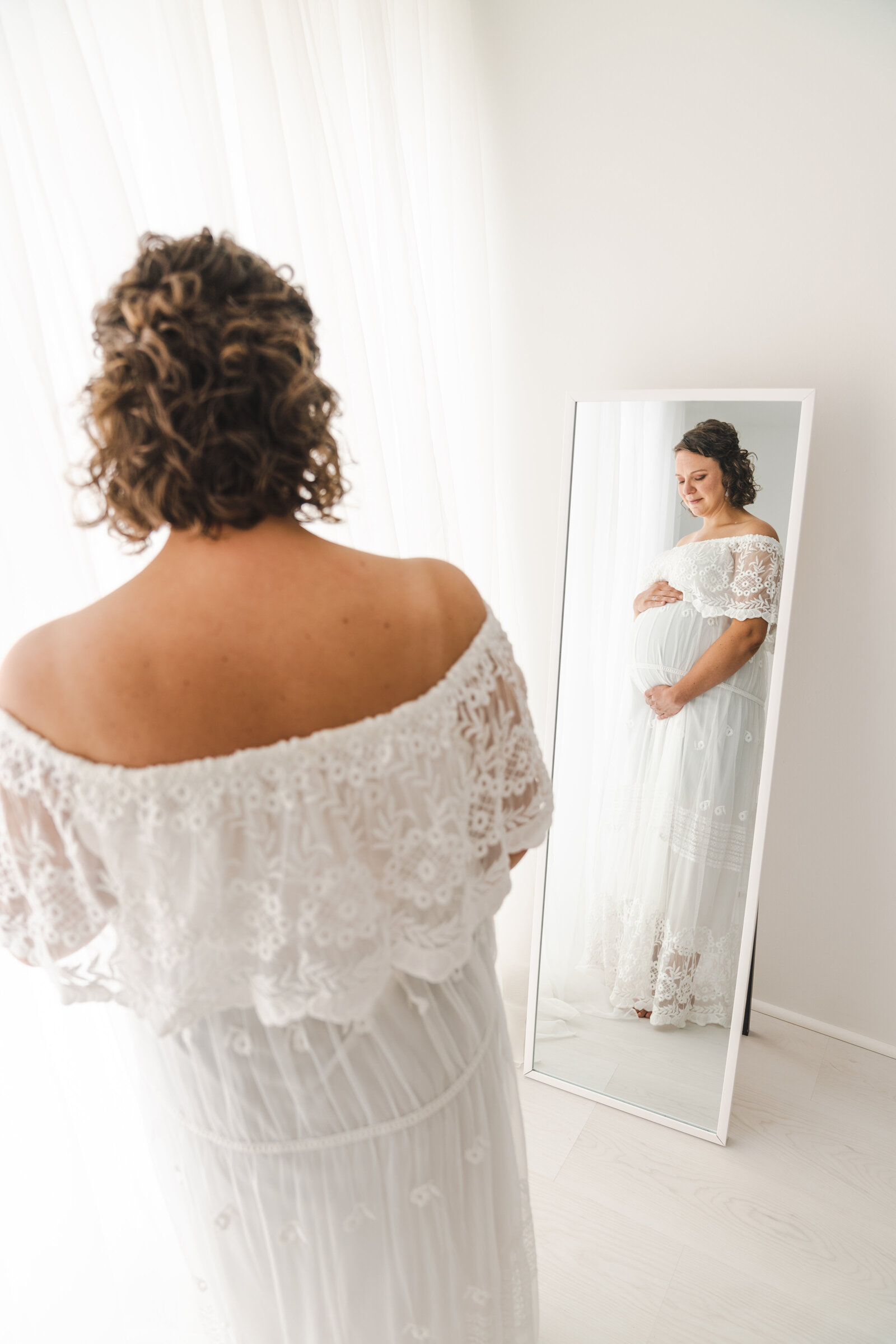 mom looking at herself in mirror