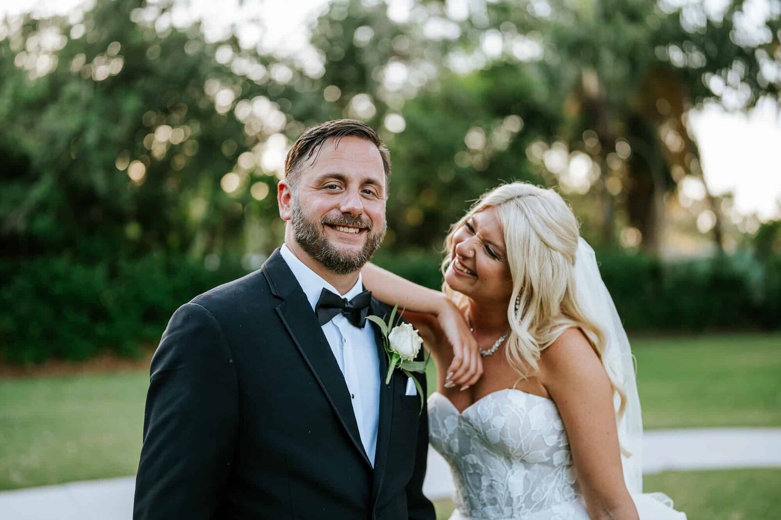 bride admiring groom at their Tampa wedding at Bakers Ranch
