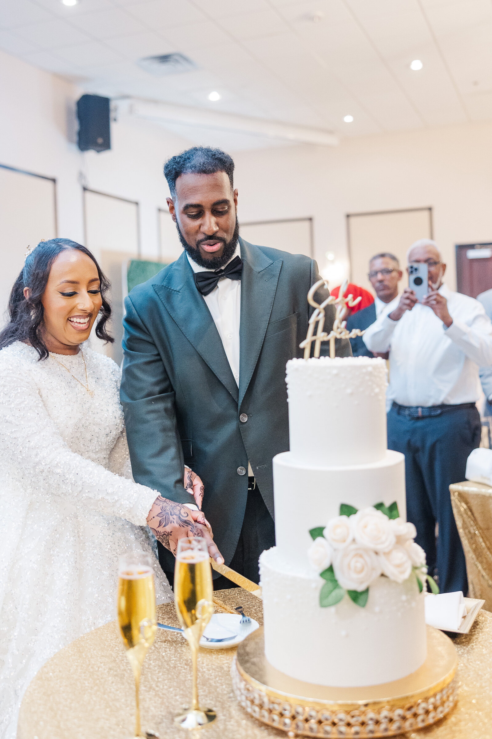 Bride-and-groom-cutting-wedding-cake