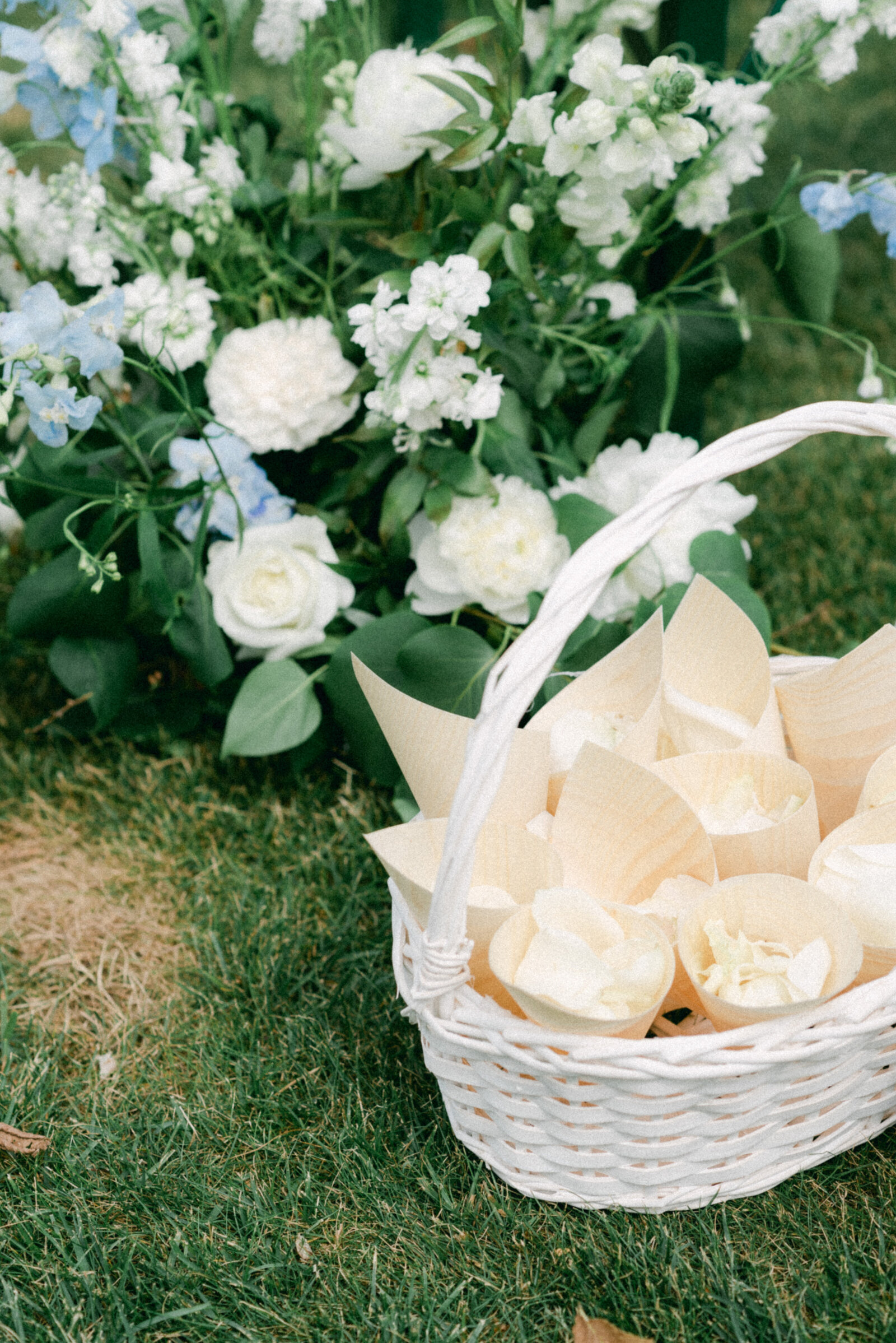 Rose petals in a basket photographed by wedding photographer Hannika Gabrielsson.