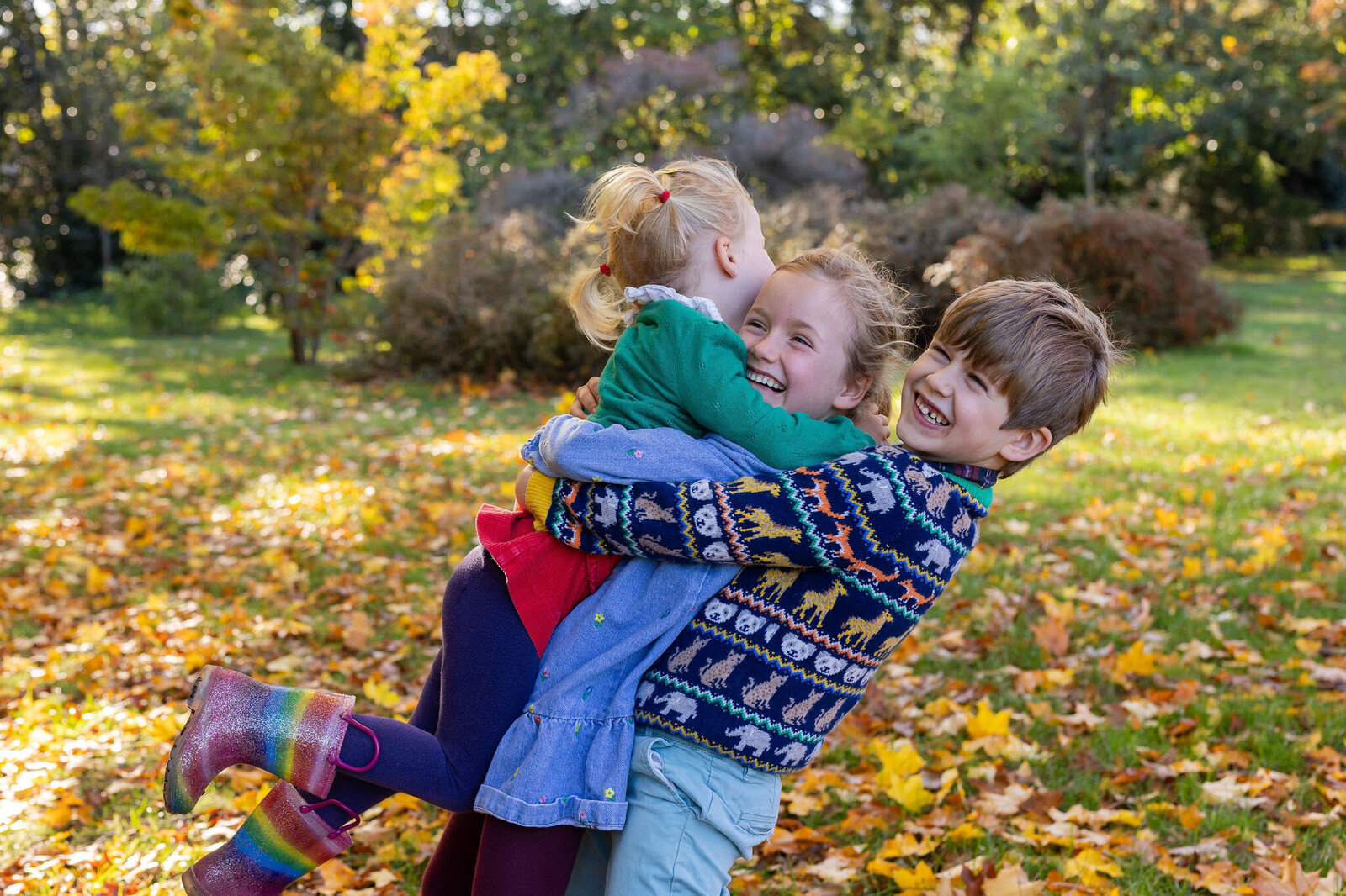 triple-hug-autumn-siblings