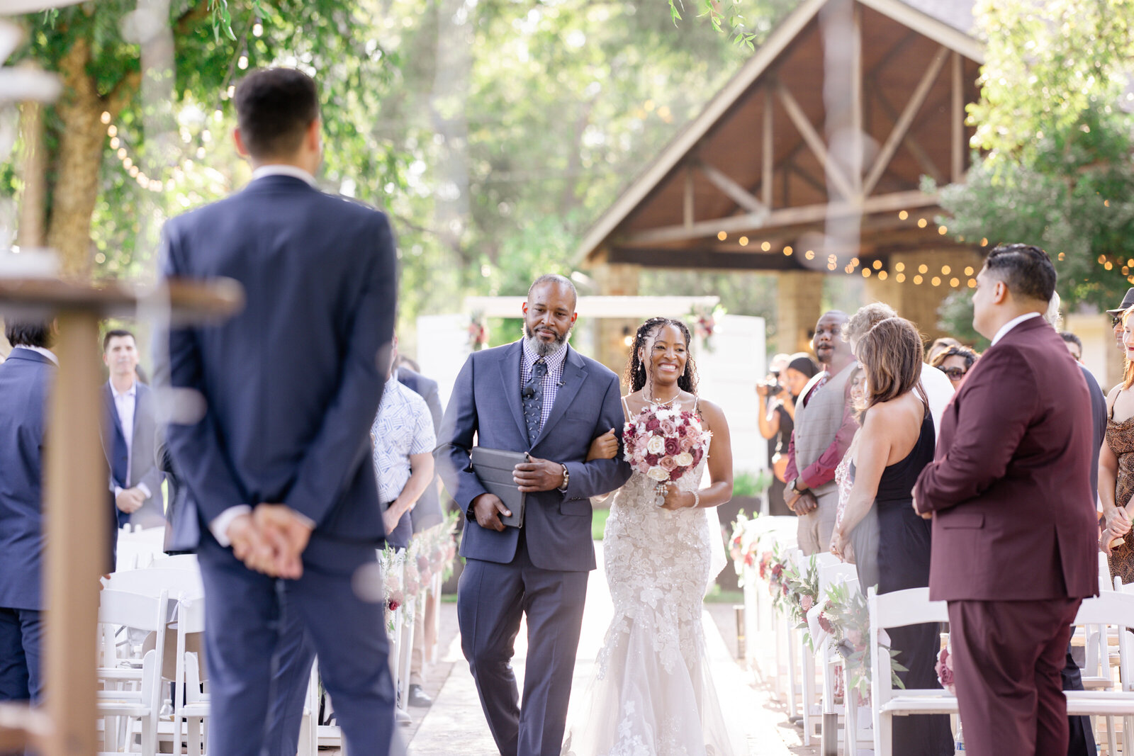Bride walking down the aisle with her father
