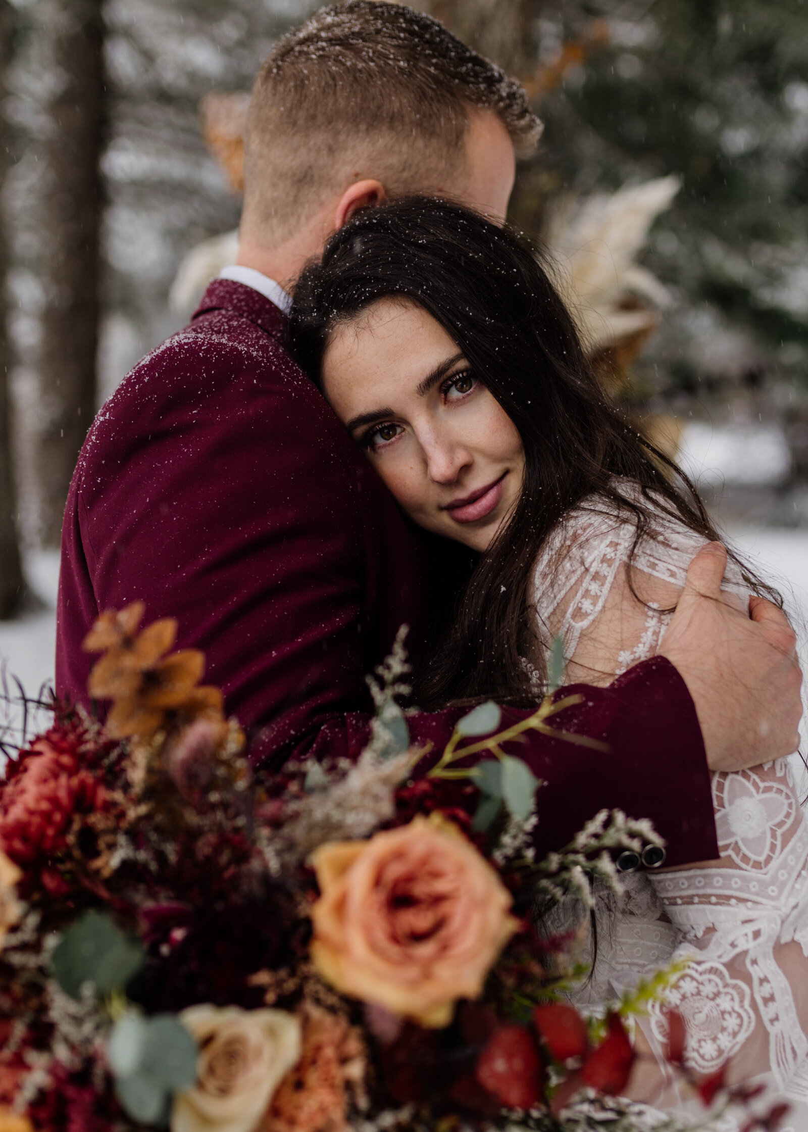 couple embracing each other and looking into the camera, pnw photographer