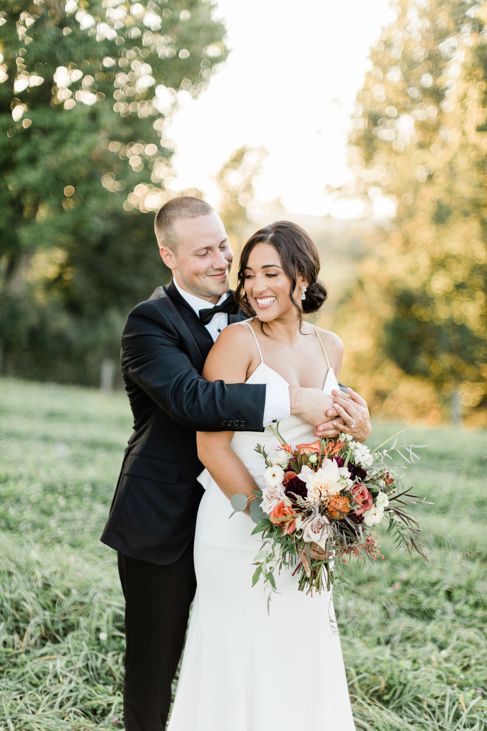 Groom Holding His Bride | Cleveland OH | The Axtells Photo and Film