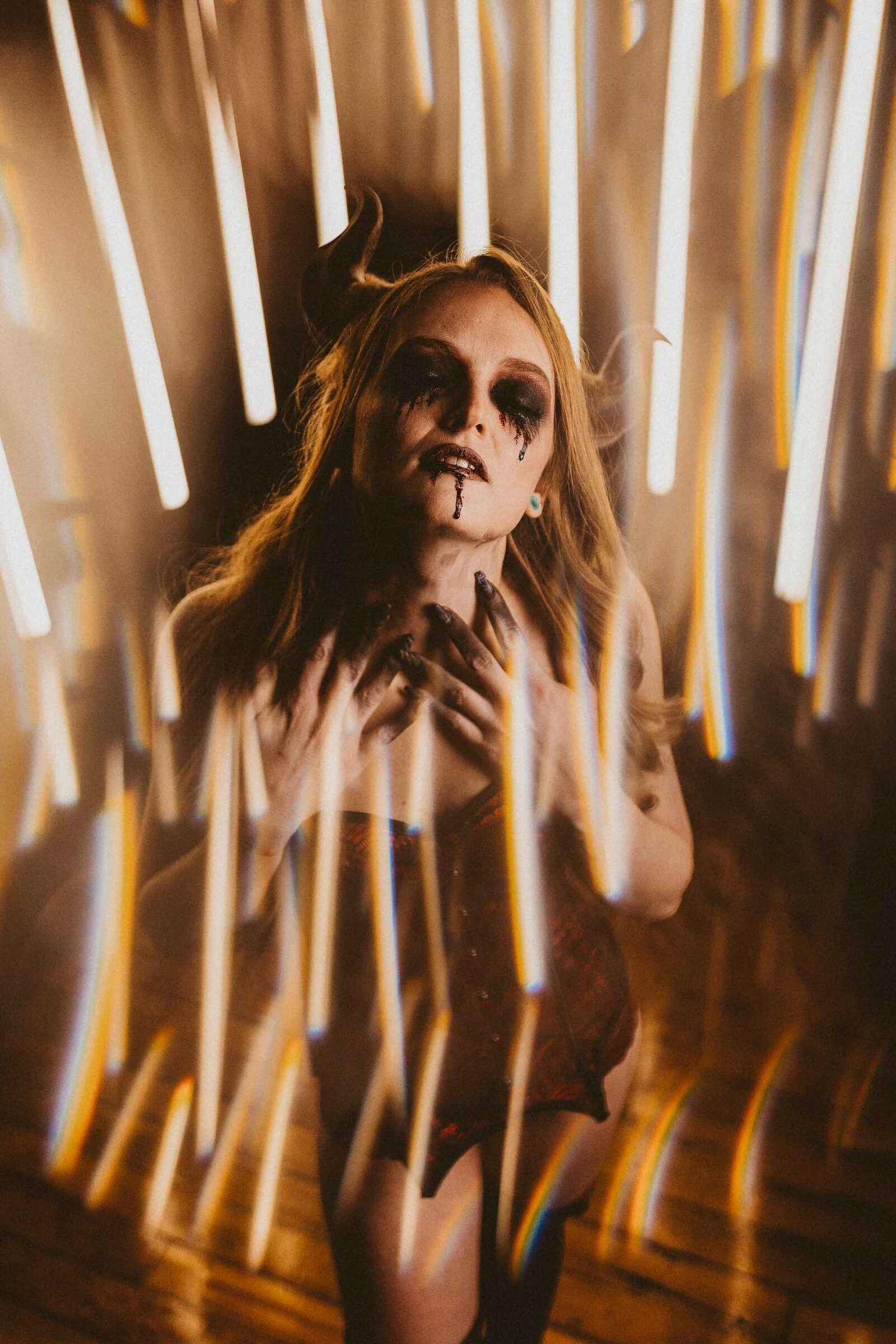 spooky looking woman with horns
